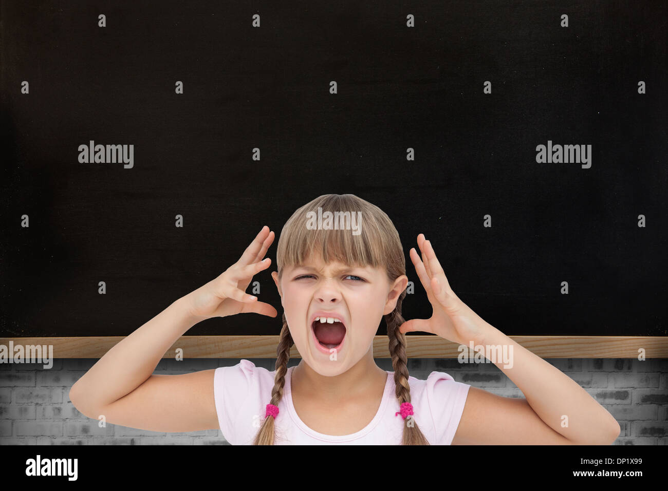 Composite image of crazy little girl Stock Photo