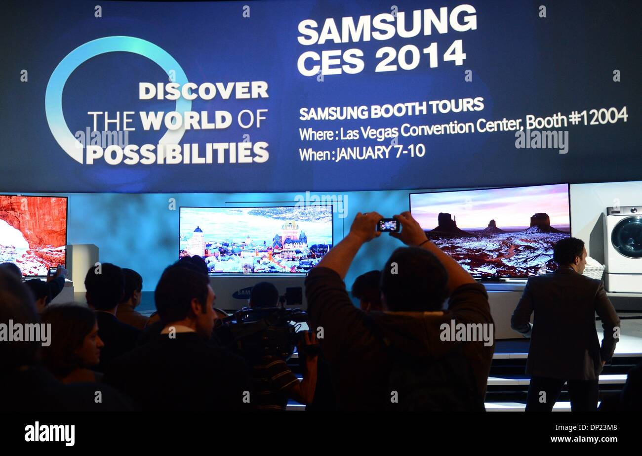 Las Vegas, USA. 06th Jan, 2014. A flat screen televisions are on display during a press conference of electronics manufacturer Samsung at the consumer electronics fair 'CES 2014' in Las Vegas, USA, 06 January 2014. The trade fair runs from 07 January 2014 to 10 January 2014. Photo: Britta Pedersen/dpa/Alamy Live News Stock Photo