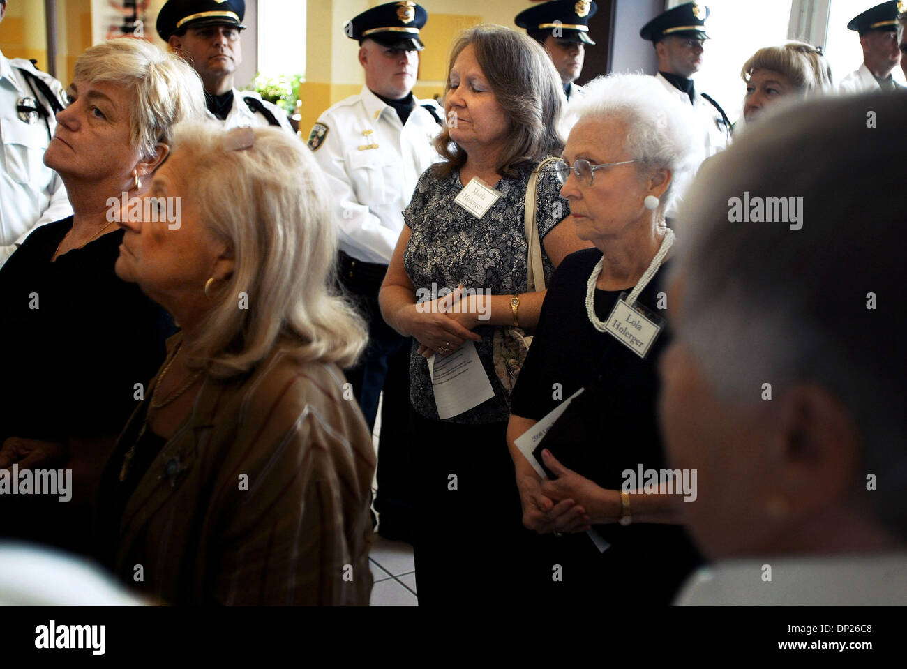 May 18, 2006; Port St. Lucie, FL, USA; Marla Holerger, daughter to fallen Sgt. Harold Holerger and Lola Holerger, widow to the officer, walk into the New Life Christian Centre in Port St. Lucie for the 2006 Law Enforcement Memorial Service for fallen officers in St. Lucie County, FL.  Mandatory Credit: Photo by Erik Lunsford/Palm Beach Post/ZUMA Press. (©) Copyright 2006 by Palm Be Stock Photo