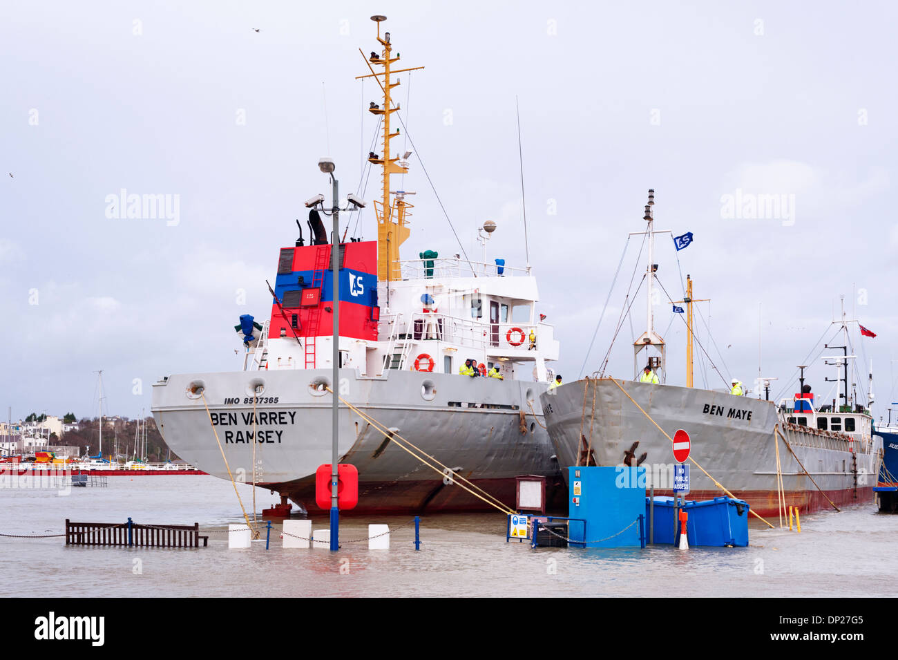 Ramsey, Isle of Man (British Isles) - cargo ships tied up in a flooded harbour during an exceptionally high tide Stock Photo