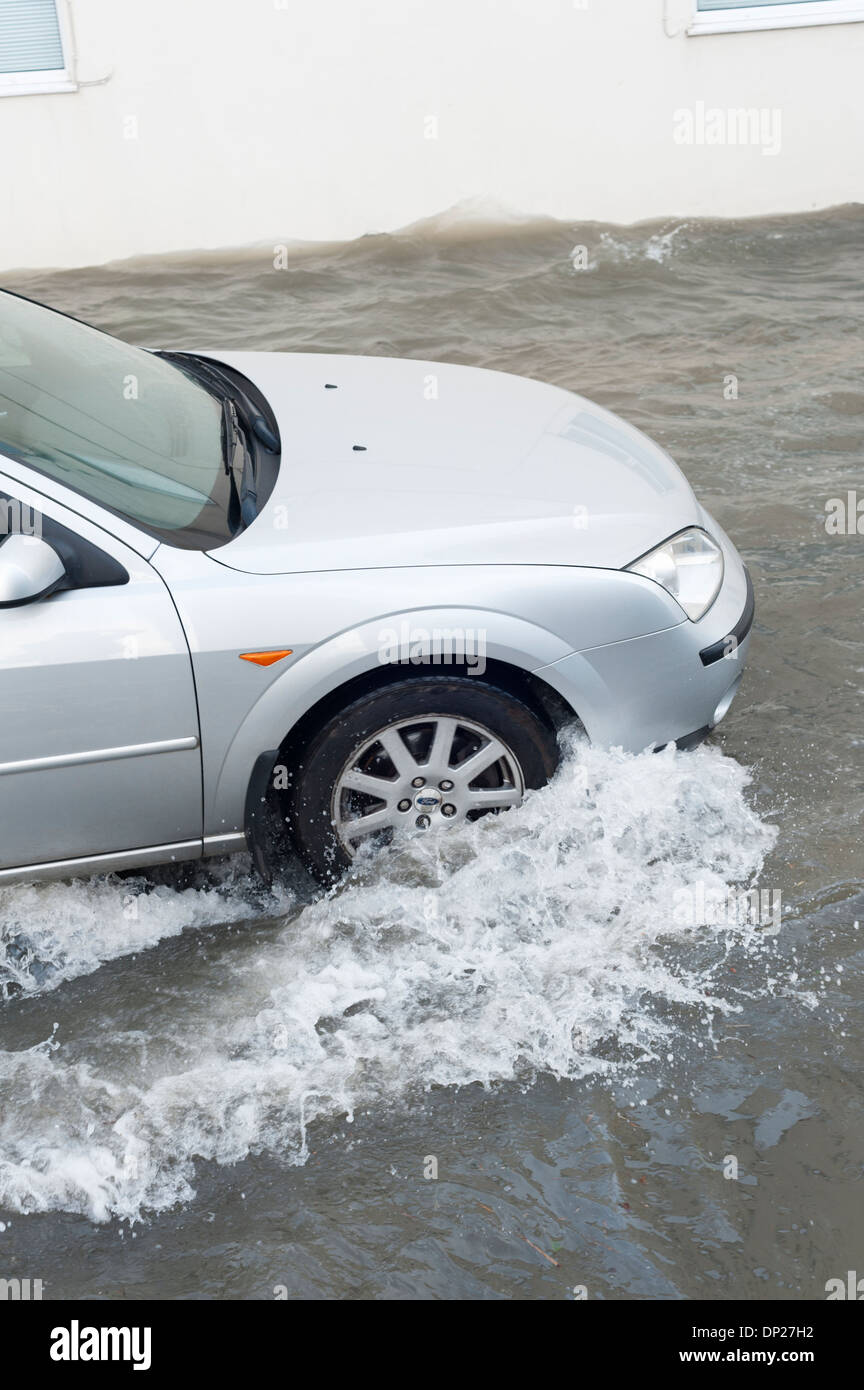 UK car driving through flood water Stock Photo Alamy