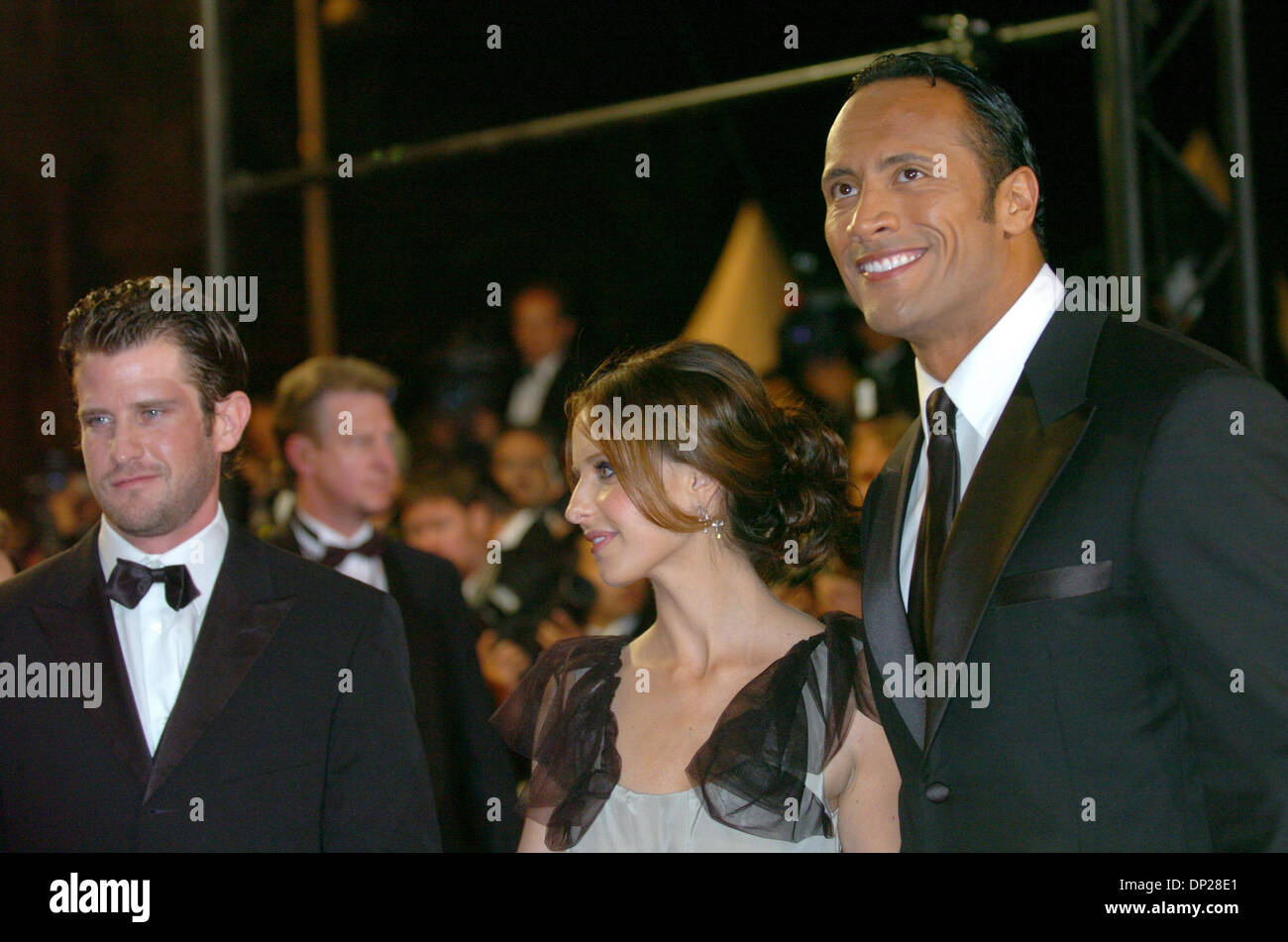May 21, 2006; Cannes, FRANCE; Writer/director RICHARD KELLY with actors SARAH MICHELLE GELLAR and DWAYNE 'THE ROCK' JOHNSON at the 'Southland Tales' premiere at the 59th Cannes Film Festival. Mandatory Credit: Photo by Frederic Injimbert/ZUMA Press. (©) Copyright 2006 by Frederic Injimbert Stock Photo