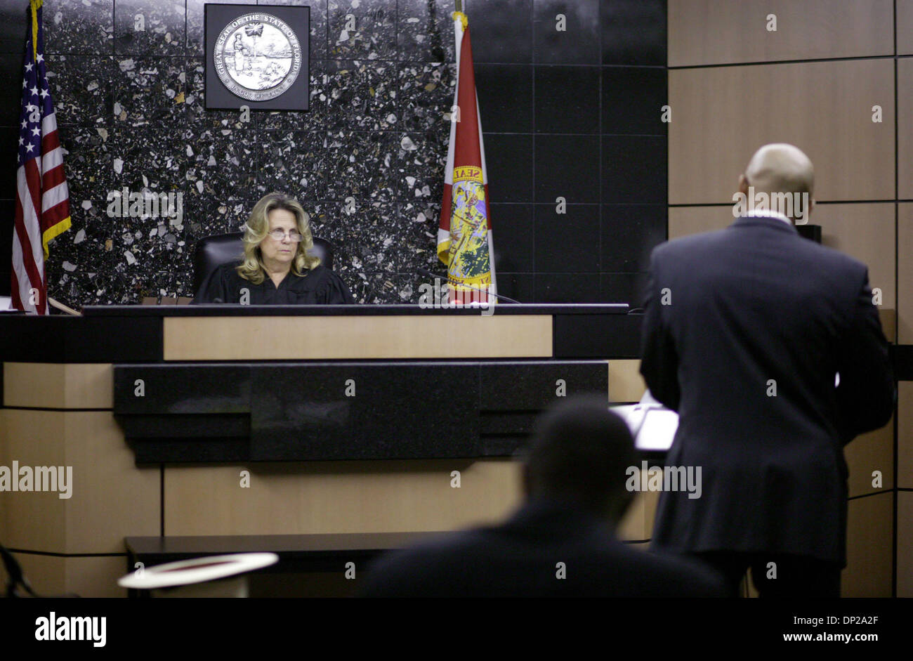 May 24, 2006; West Palm Beach, FL, USA; Judge Karen Martin listens to plaintiff attorney Patrick Cousins Wednesday afternoon in a paternity suit against Kenneth Miller challenging who the father of Jerrod Miller is. Mandatory Credit: Photo by Greg Lovett/Palm Beach Post/ZUMA Press. (©) Copyright 2006 by Palm Beach Post Stock Photo