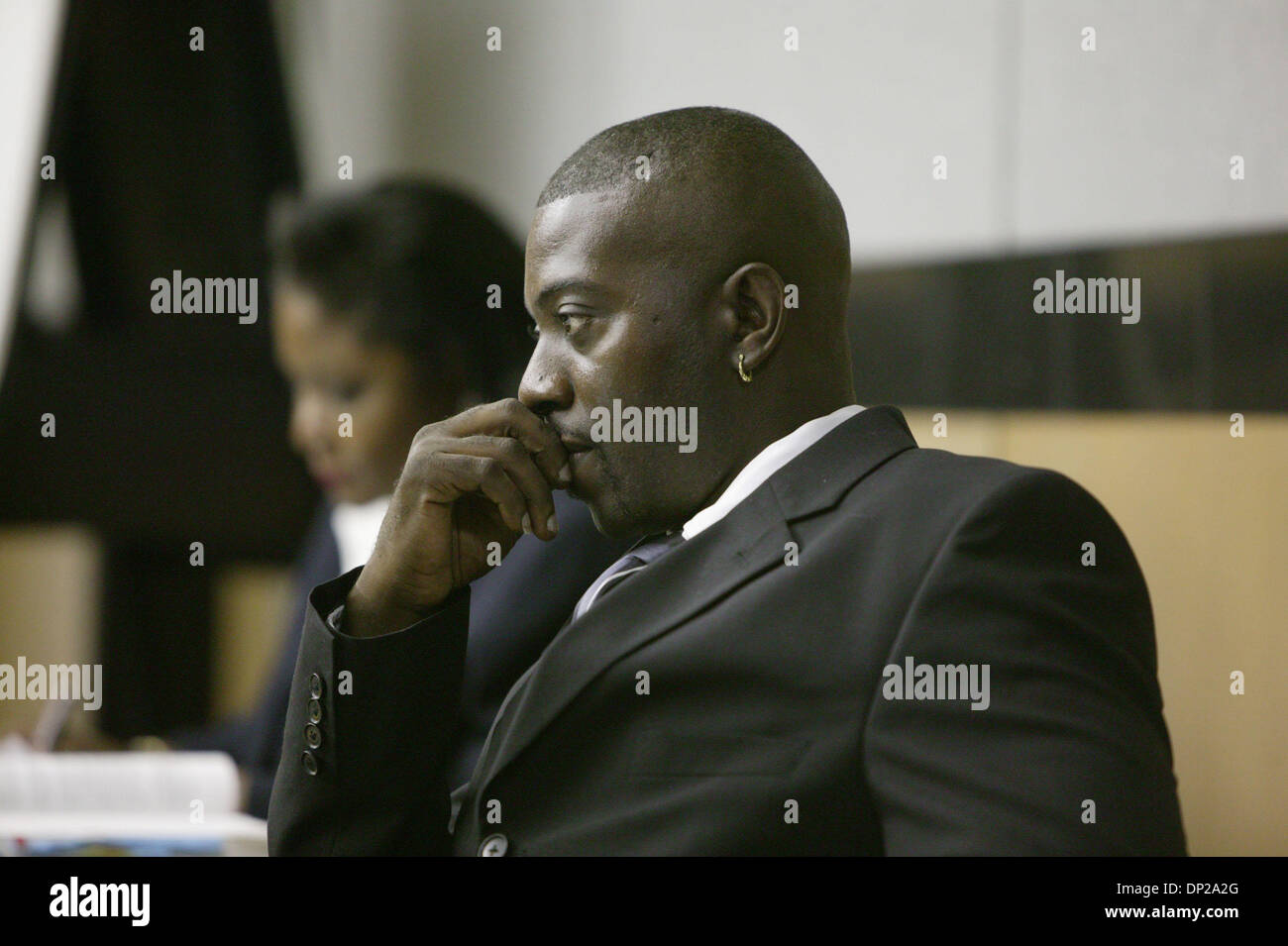 May 24, 2006; West Palm Beach, FL, USA; Kenneth Miller at the defense table Wednesday  in a paternity suit in Judge Karen Martin's courtroom.Terry Glover claims he is the biological father of Jerrod Miller. Mandatory Credit: Photo by Greg Lovett/Palm Beach Post/ZUMA Press. (©) Copyright 2006 by Palm Beach Post Stock Photo