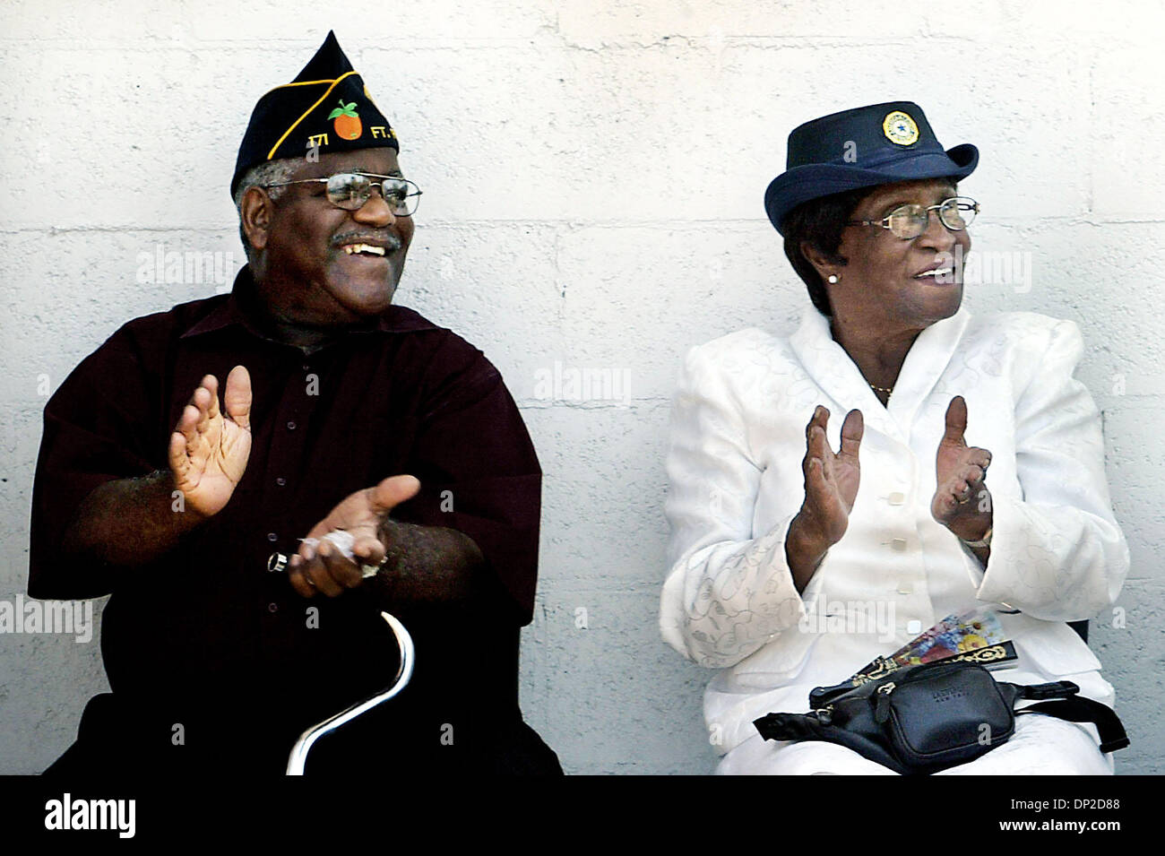 May 28, 2006; Fort Pierce, FL, USA; Army Veteran William Cuningham, left, and Mary Platt share a laugh during the Memorial Day Service honoring soldiers from St. Lucie County at the Charles O. Hines American Legion Post 171 Sunday.  Mandatory Credit: Photo by Meghan McCarthy/Palm Beach Post/ZUMA Press. (©) Copyright 2006 by Palm Beach Post Stock Photo