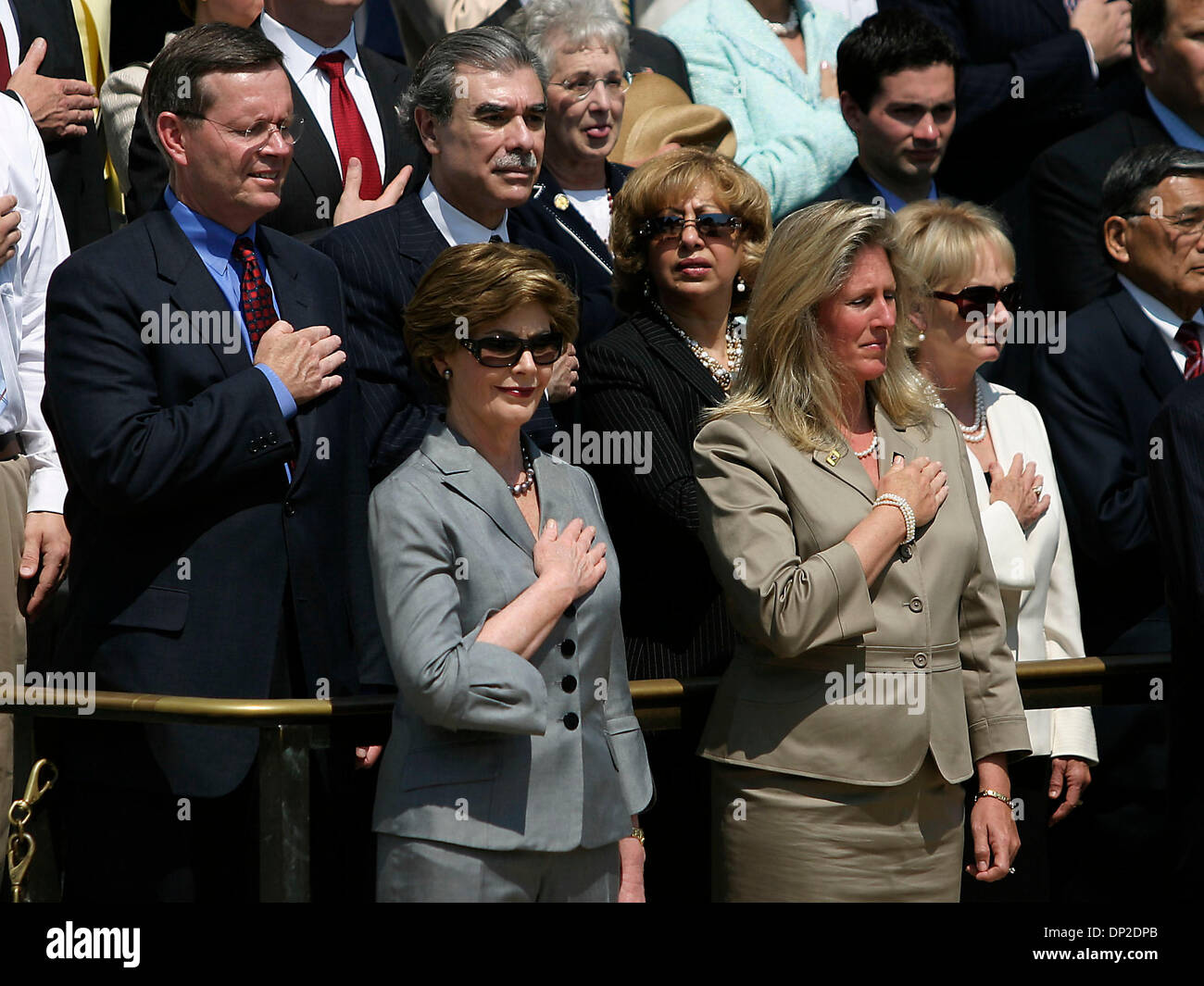 May 29, 2006; Arlington, VA, USA; First Lady, LAURA BUSH and wife of Major General Swan attend the wreath laying ceremony at the Tomb of the Unknown Solider in Arlington Cemetery in honor of Memorial Day. Mandatory Credit: Photo by James Berglie/ZUMA Press. (©) Copyright 2006 by James Berglie Stock Photo