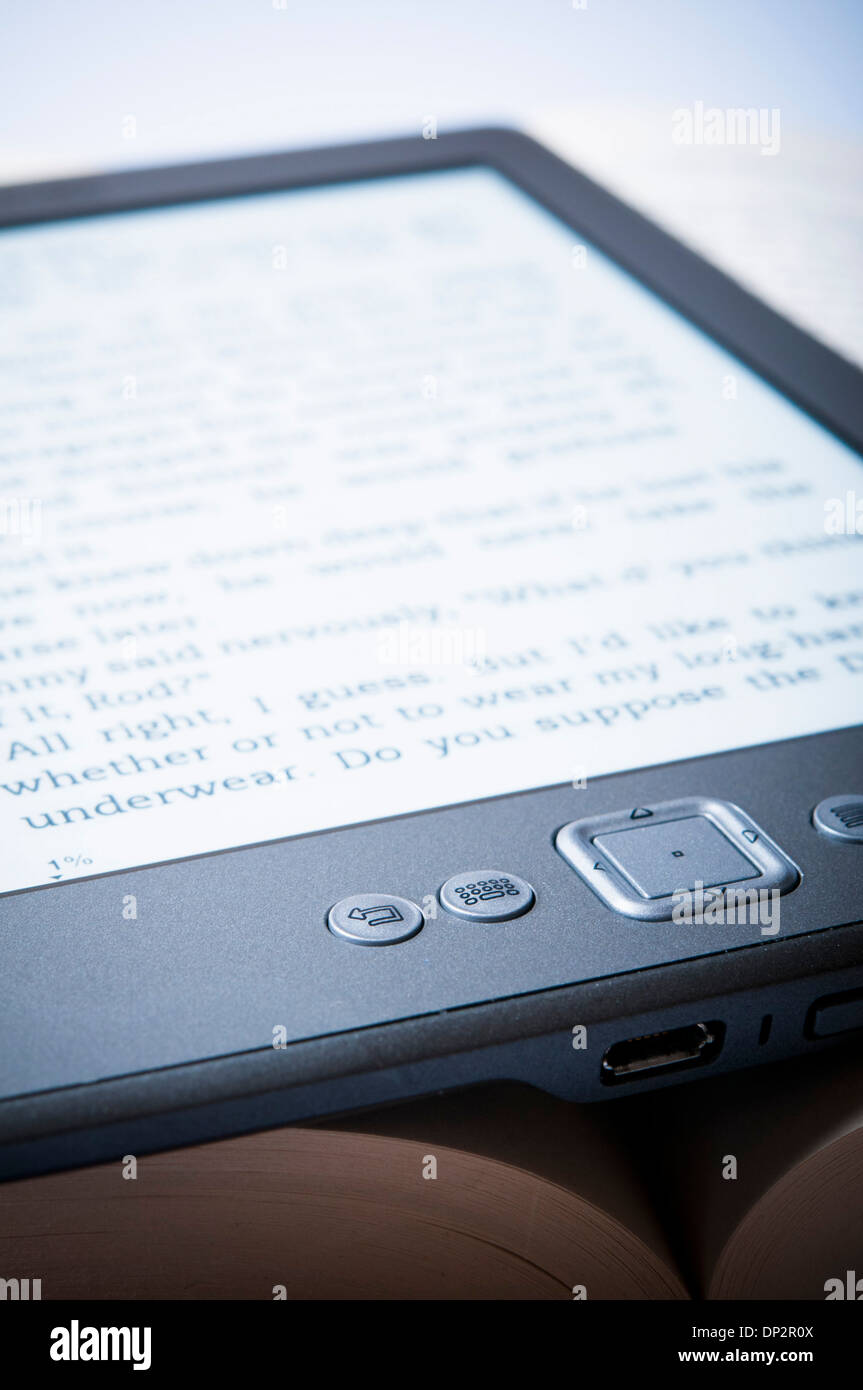Kindle on a book Stock Photo