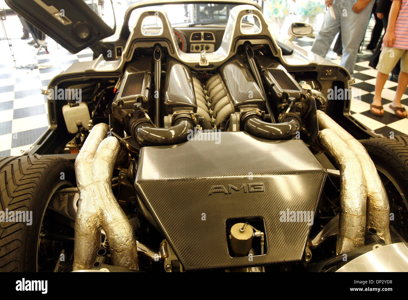 Jun 14, 2006; Los Angeles, CA, USA; Exotic car dealer Mark Johnston unveils a Mercedes-Benz AMG CLK-GTR roadster during a news conference to announce filing of a lawsuit against a leading auto maker and affiliates over alleged failure to refund purchase price of $1.7 million exotic car that died after driving just 10 blocks, at the Grand Prix Motors dealership. The car is one of on Stock Photo