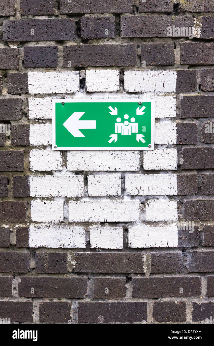 Direction sign to health and safety fire assembly point Stock Photo Alamy