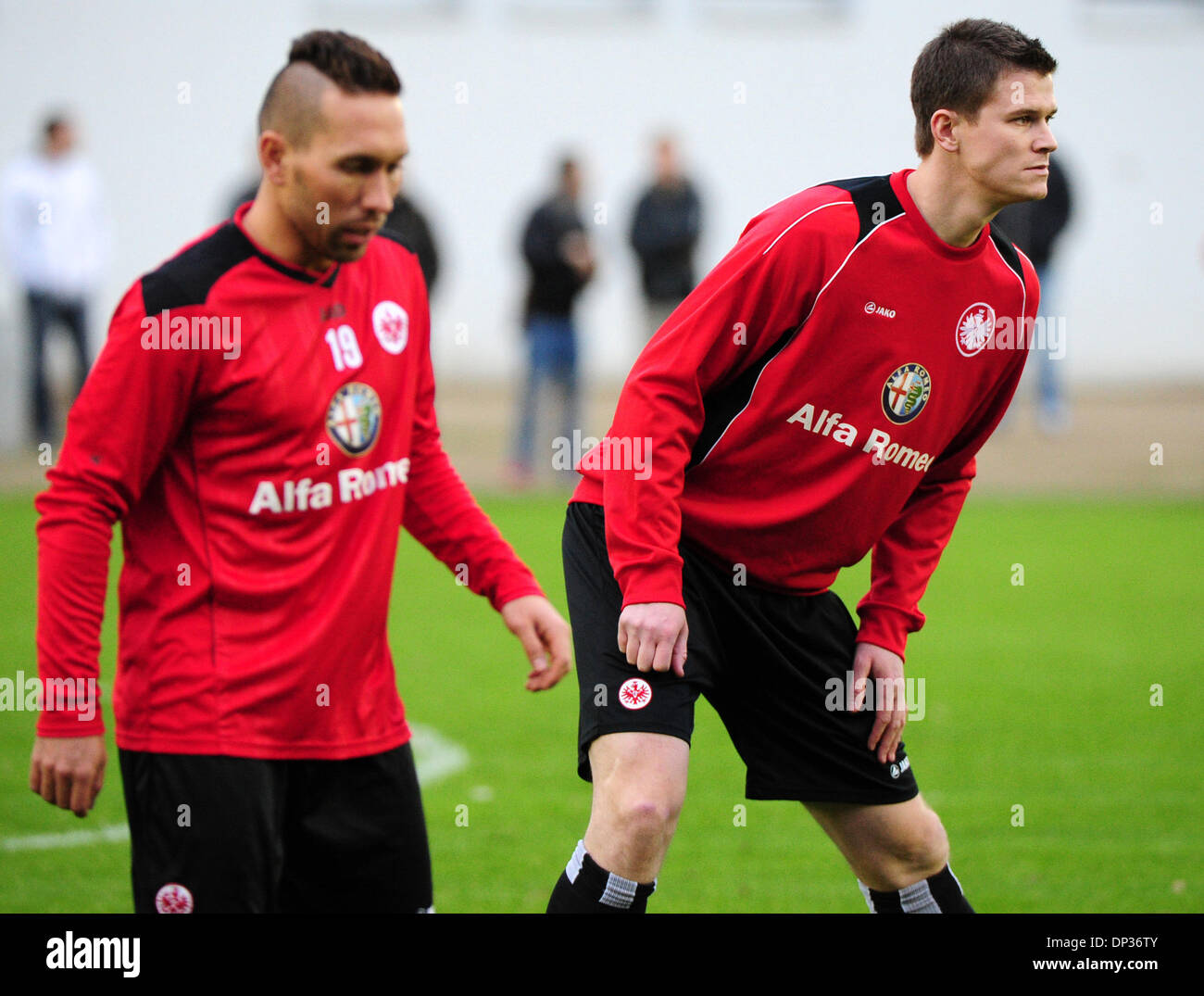 The new players of Eintracht Frankfurt, Tobias Weis and Alexander Madlung, stand on the field during the first training of the team for the next Bundesliga season. Photo: Daniel Reinhardt/dpa Stock Photo