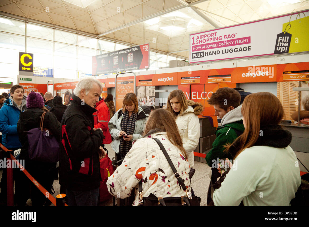 Easyjet check in area, crowded with passengers, Stansted airport, Essex, England UK Stock Photo