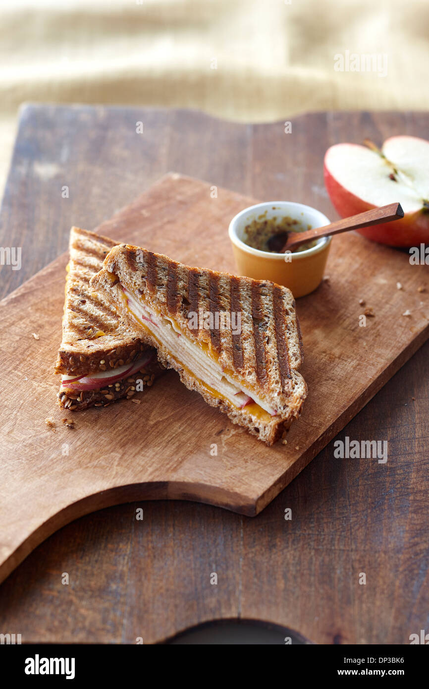 Grilled Cheese Panini with Cheddar and Apple, Half of Red Apple and