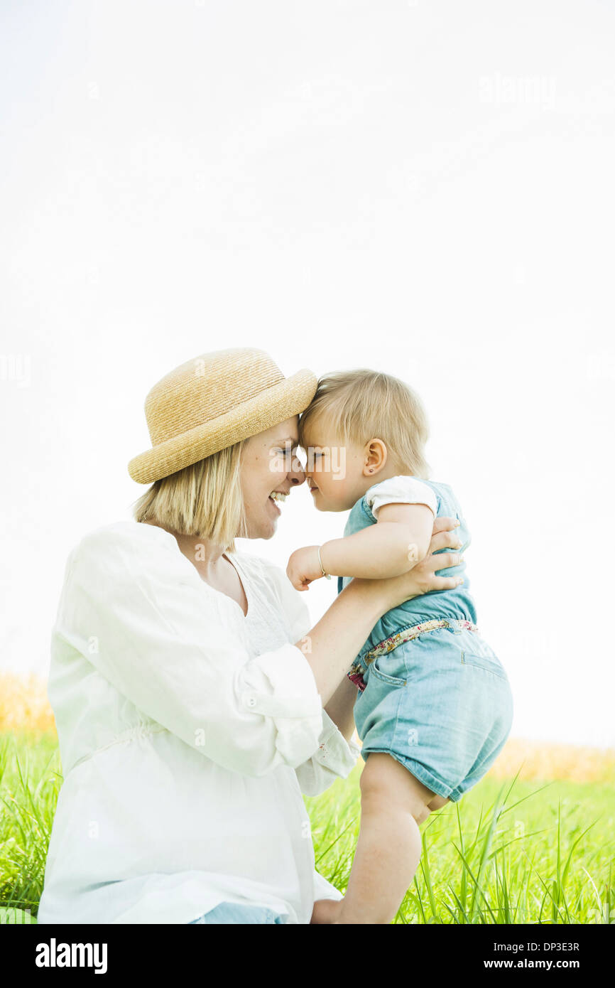 Mother and Baby Daughter Outdoors, Mannheim, Baden-Wurttemberg, Germany Stock Photo