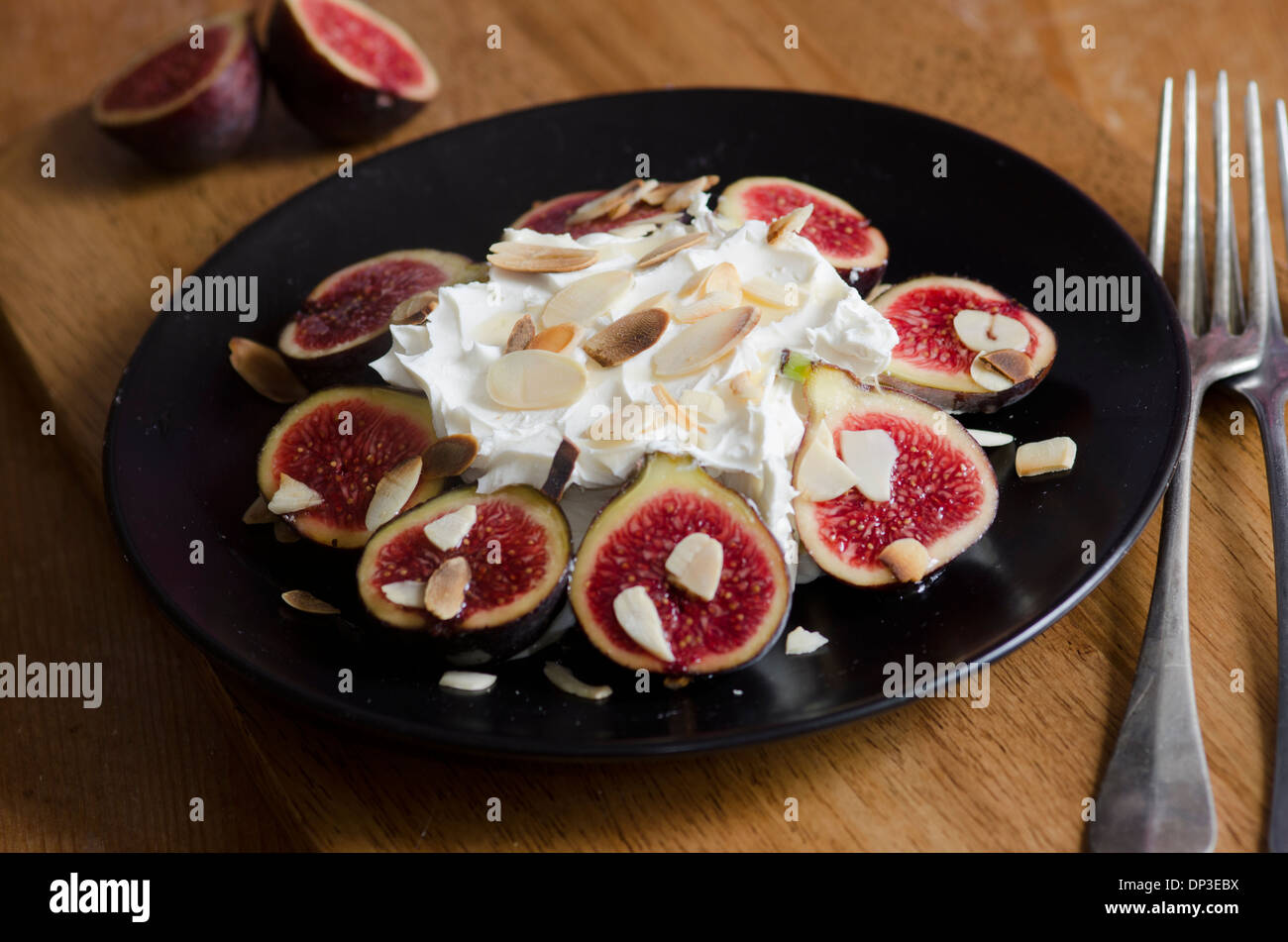 Grilled figs with mascarpone Stock Photo Alamy