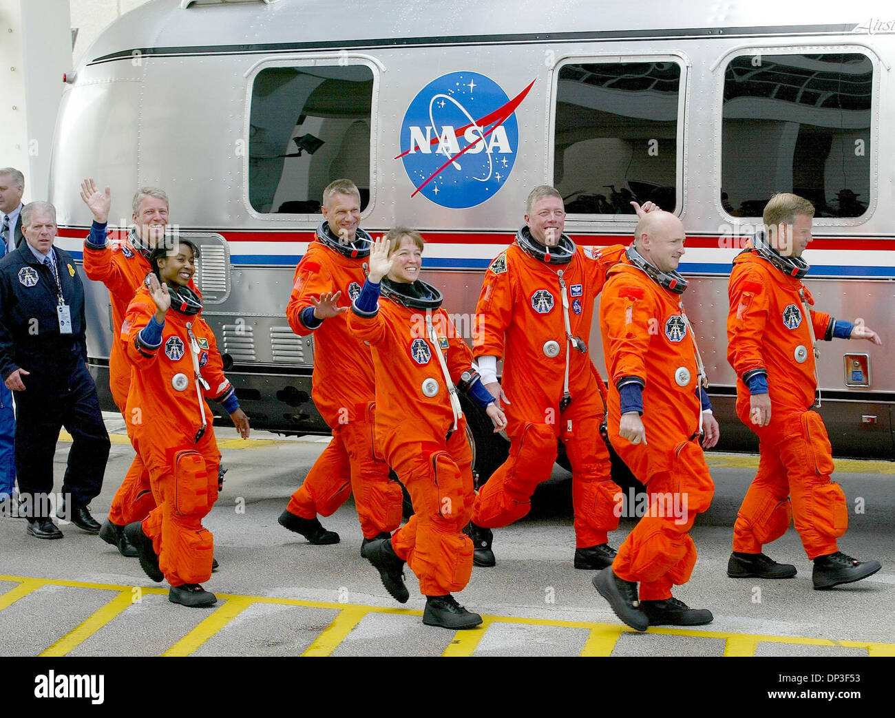 Jul 02, 2006; Cape Canaveral, FL, USA; Space shuttle Discovery crew members walkout Sunday morning on their way to the space craft at Kennedy Space Center. (LtoR) Astronauts Thomas Reiter of Germany,  Stephanie D. Wilson,  Peirs J. Sellers, Lisa M. Nowak,  Michael E. Fossum, Mark E. Kelly,  and commander Steven W. Lindsey. The bad weather forced NASA to reschedule the launch for Tu Stock Photo
