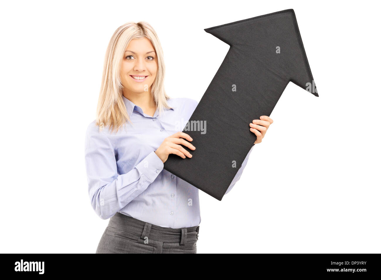 Beautiful smiling woman holding a big black arrow pointing up Stock ...