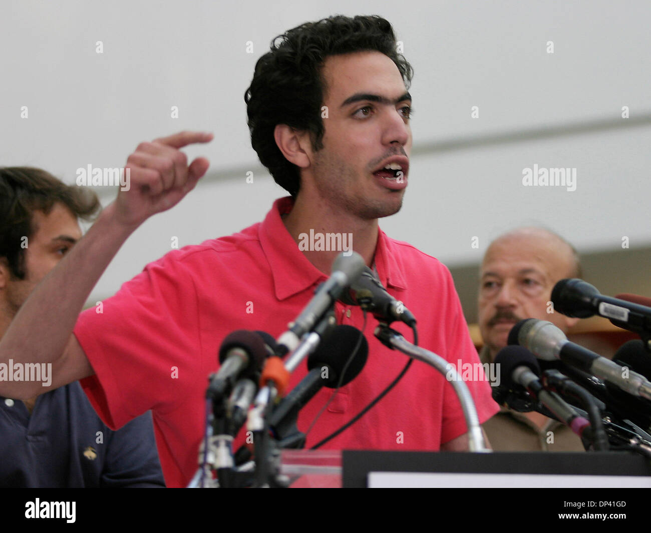 Jul 20, 2006; Baltimore, Maryland, USA; TAREK DIKA  speak to the press about his experience fleeing Lebanon where the Israeli - Hezbollah conflict continues to intensify. The first flight of American refugees from Lebanon arrived at BWI Airport (Baltimore/Washington) this morning. Most were American citizens visiting Lebanon at the time of the most recent attacks by Israel, and som Stock Photo