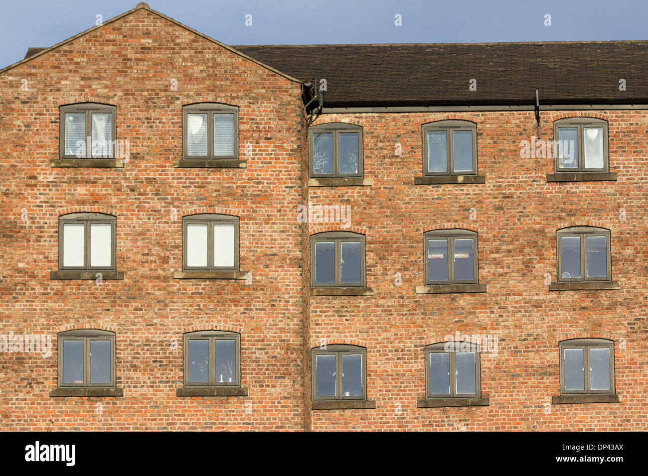 Brick wall and windows of one of the historic buildings in Newcastle Upon Tyne Stock Photo