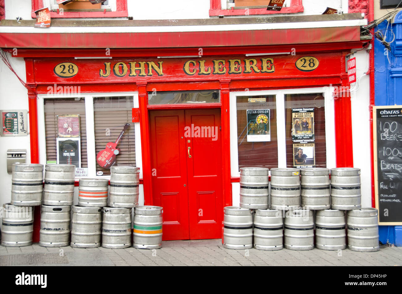 Colorful red Irish pub with beer barrels outside, Parliamentr Street