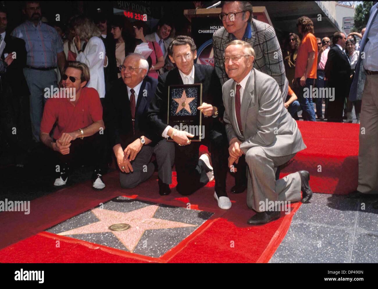 Mar. 13, 2006 - JERRY LEE LEWIS STAR ON HOLLYWOOD WALK OF FAME 06-1989.WITH WIFE KERRIE SON JERRY LEE II AT 2 1/2 AND AUNT JUDY WILLIAMS. MICHELSON-(Credit Image: © Globe Photos/ZUMAPRESS.com) Stock Photo