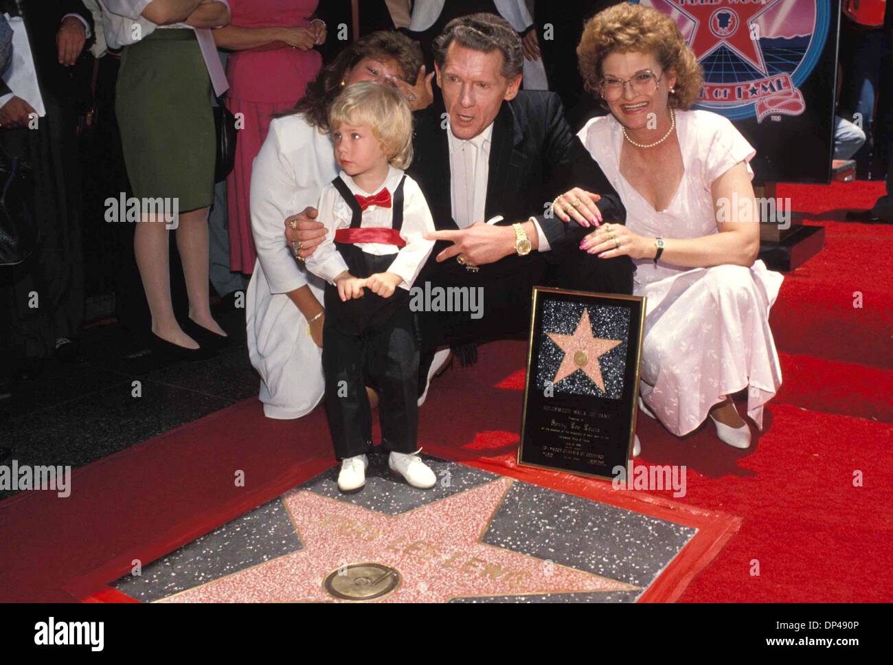Mar. 13, 2006 - JERRY LEE LEWIS STAR ON HOLLYWOOD WALK OF FAME 06-1989.WITH WIFE KERRIE SON JERRY LEE II AT 2 1/2 AND AUNT JUDY WILLIAMS. MICHELSON-(Credit Image: © Globe Photos/ZUMAPRESS.com) Stock Photo