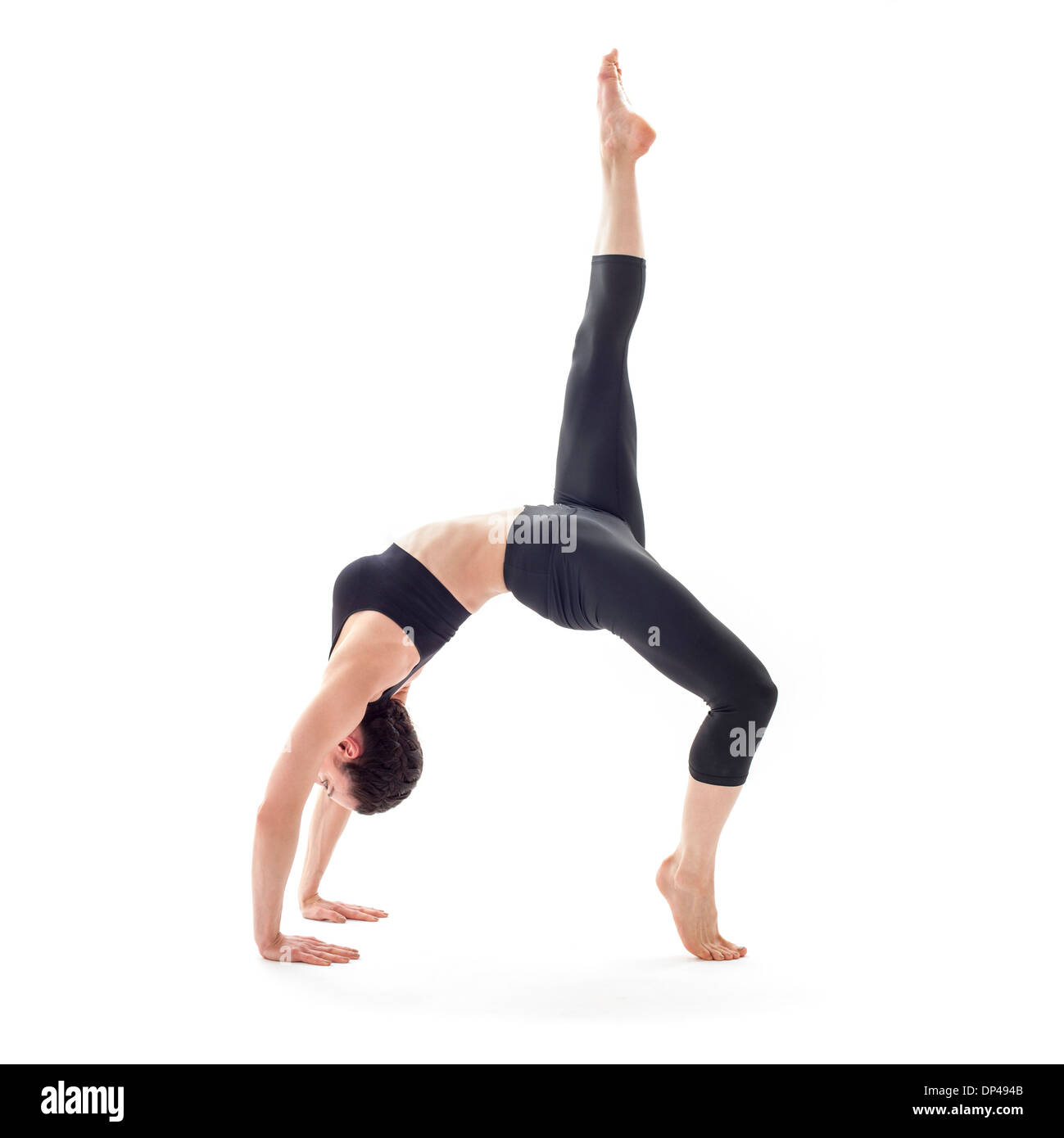 Woman practicing yoga Stock Photo