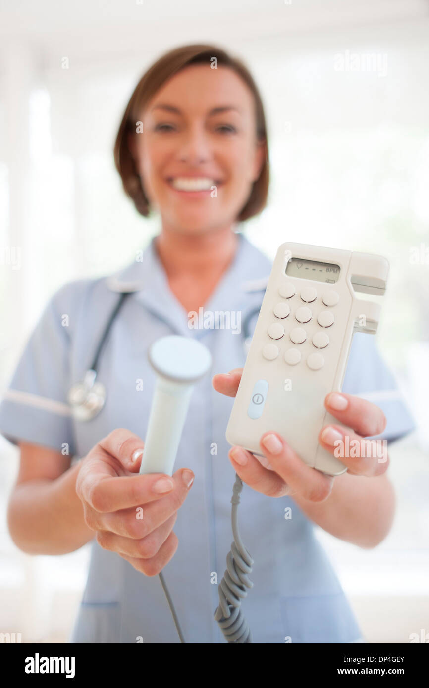 Handheld ultrasound machine Stock Photo