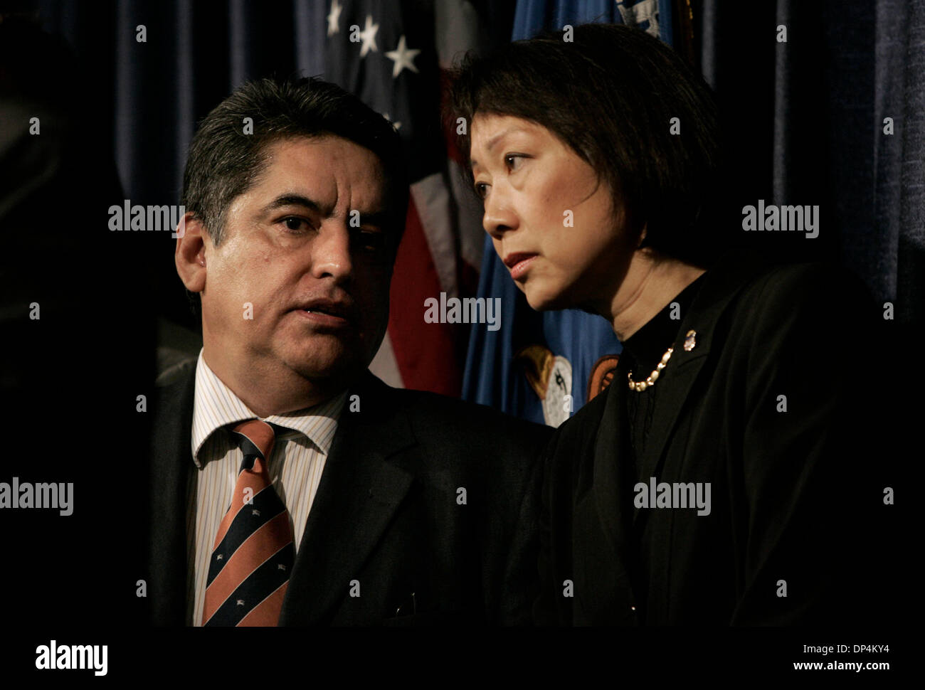Aug 17, 2006; San Diego, CA, USA; Mexico's Deputy Attorney General JOSE LUIS SANTIAGO VASCONCELOS, left, and  US Attorney CAROL LAM, right talk  during a press conference discussing the arrest on Monday August 14, 2006 in international waters off Baja California of  Francisco Javier Arellano Felix, the kingpin of the Arellano-Felix drug cartel. Arrested along with Arellano Felix we Stock Photo
