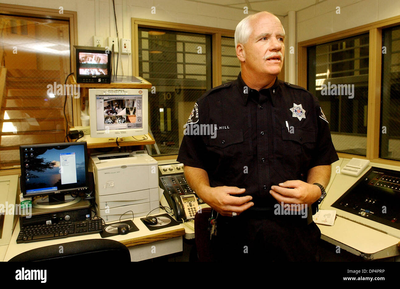 Aug 21, 2006; Boulder, CO, USA; Commander DWIGHT HILL of the Boulder County Jail explains the procedures that will be used to incarcerate John Mark Karr who is custody in connection with the murder of JonBenet Ramsey in 1996. Karr is currently awaiting an extradition hearing in Los Angeles California. Behind Hill are two different holding cells. Mandatory Credit: Photo by Paul Aike Stock Photo