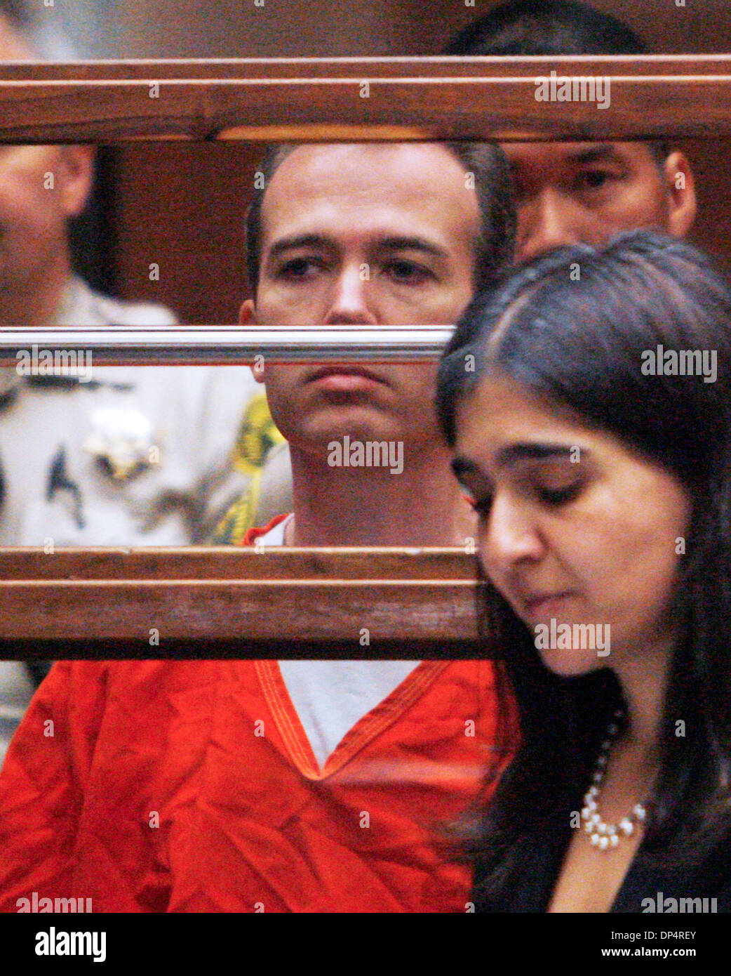 Aug 23, 2006; Los Angeles, CA, USA; JOHN MARK KARR looks at his attorney, HAYDEH TAKASUGI, LA County deputy public defender, during his extradition hearing at LA Superior Court. Karr, the suspect in the murder of 6-year-old JonBenet Ramsey, waived his rights and will be sent to Colorado, where the body of the child beauty queen was found a decade ago. Mandatory Credit: Photo by Mar Stock Photo