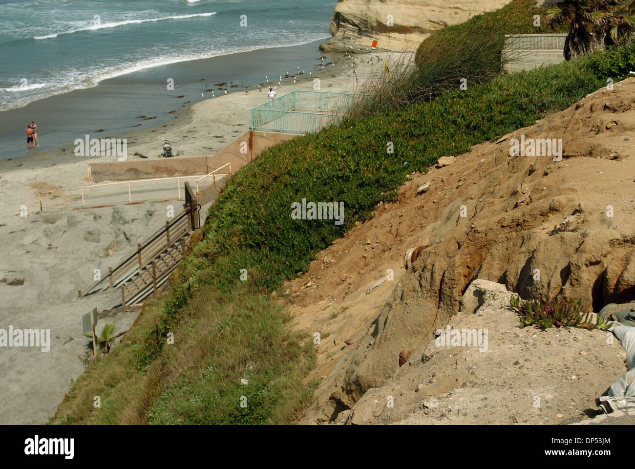 Aug 30, 2006; Solana Beach, CA, USA; COLIN HEBELER, a lifeguard at Fletcher  Cove, raced in to the water to tell a surfer that he was inside the  swimming and boogie board