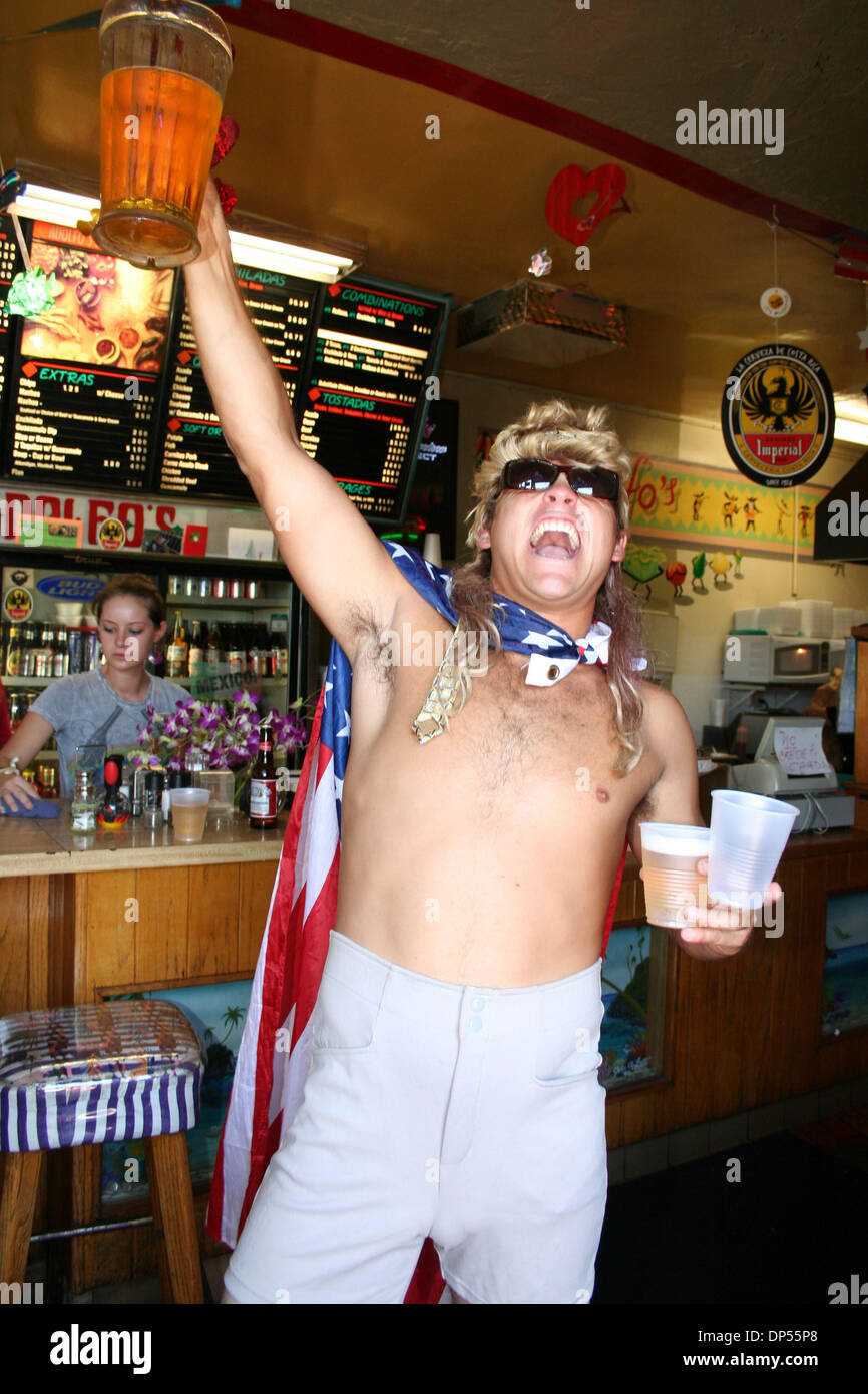 Sep 03, 2006; Laguna Beach, CA, USA; The annual Kavorkian 5000 Surf Contest is held every summer over Labor Day weekend by a group of local surfers. The local guys dress up in hilarious costumes, drink lots of beer at several bars along Pacific Coast Highway, then the entire group heads down to the beach to watch the men compete in a drunken surfing contest.  Mandatory Credit: Phot Stock Photo