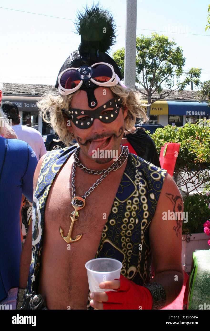 Sep 03, 2006; Laguna Beach, CA, USA; The annual Kavorkian 5000 Surf Contest is held every summer over Labor Day weekend by a group of local surfers. The local guys dress up in hilarious costumes, drink lots of beer at several bars along Pacific Coast Highway, then the entire group heads down to the beach to watch the men compete in a drunken surfing contest.  Mandatory Credit: Phot Stock Photo