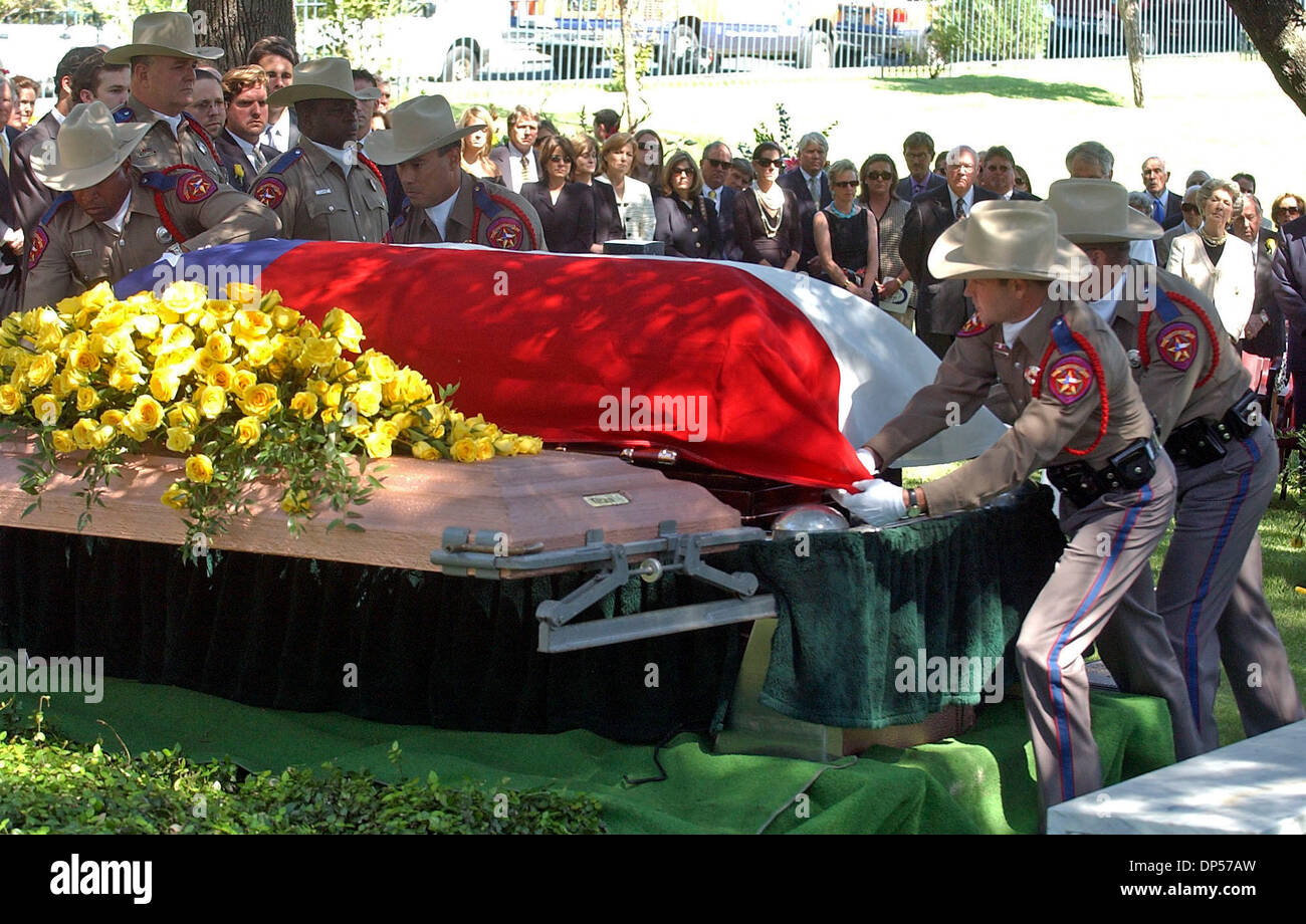 Sep 06, 2006; Austin, TX, USA; An honor guard of DPS troopers pulls the Texas Flag off the casket of Nellie Connally Wednesday at the Texas State C emetery in Austin. Nellie Connally, the widow of former Texas Gov. John Connally, has died. She was the last survivor among those who were in President John F. Kennedy's limousine when he was assassinated in November 1963. Connally died Stock Photo