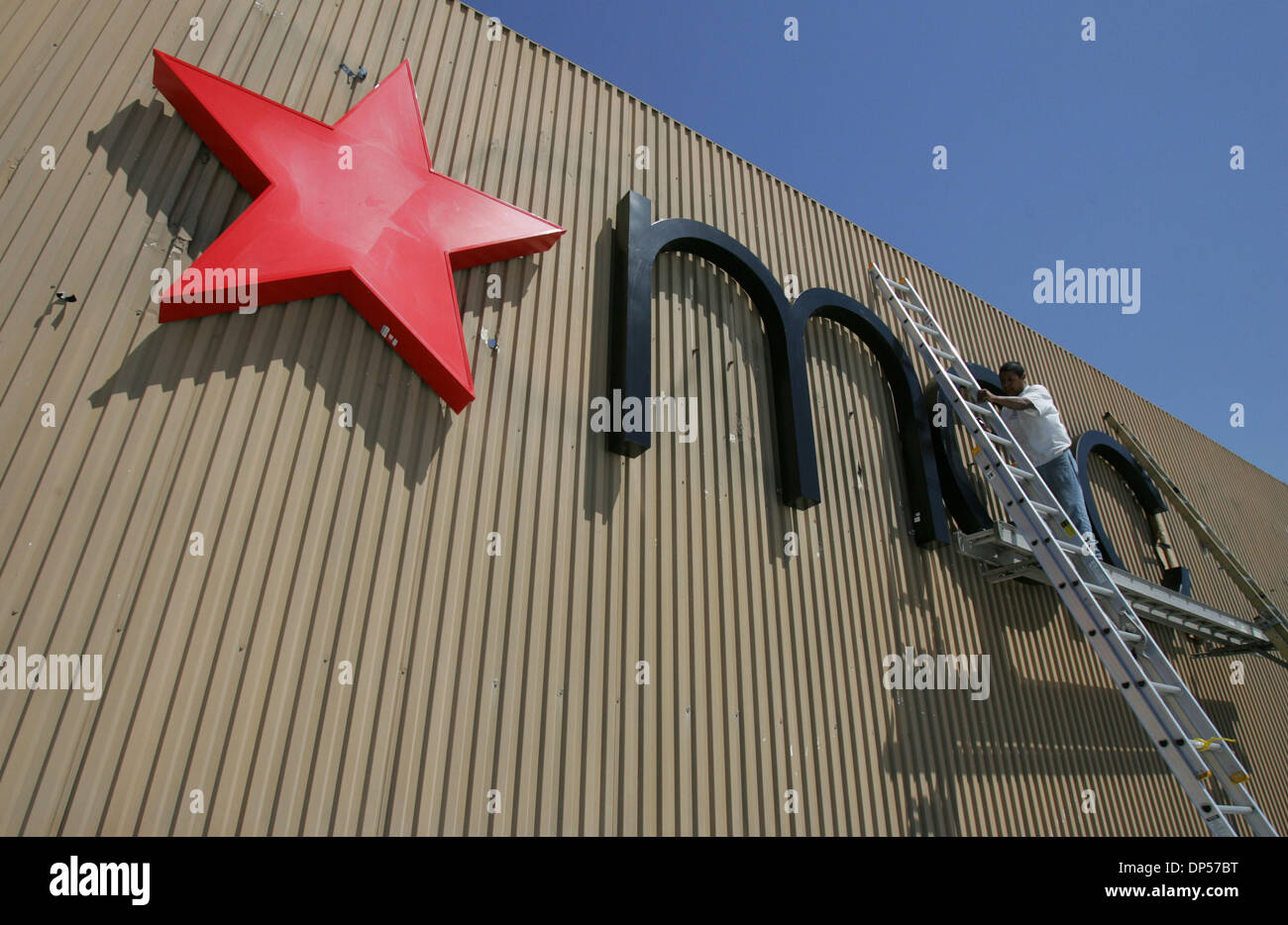 Sep 06, 2006; San Diego, CA, USA; Sign Method Electrical Sign & Neon (from Long Beach) employee Enrique Ramirez works on installing a  Macy's sign where the Robinsons May sign use to be at Westfield Mission Valley.   Mandatory Credit: Photo by John R. McCutchen/SDU-T/ZUMA Press. (©) Copyright 2006 by SDU-T Stock Photo