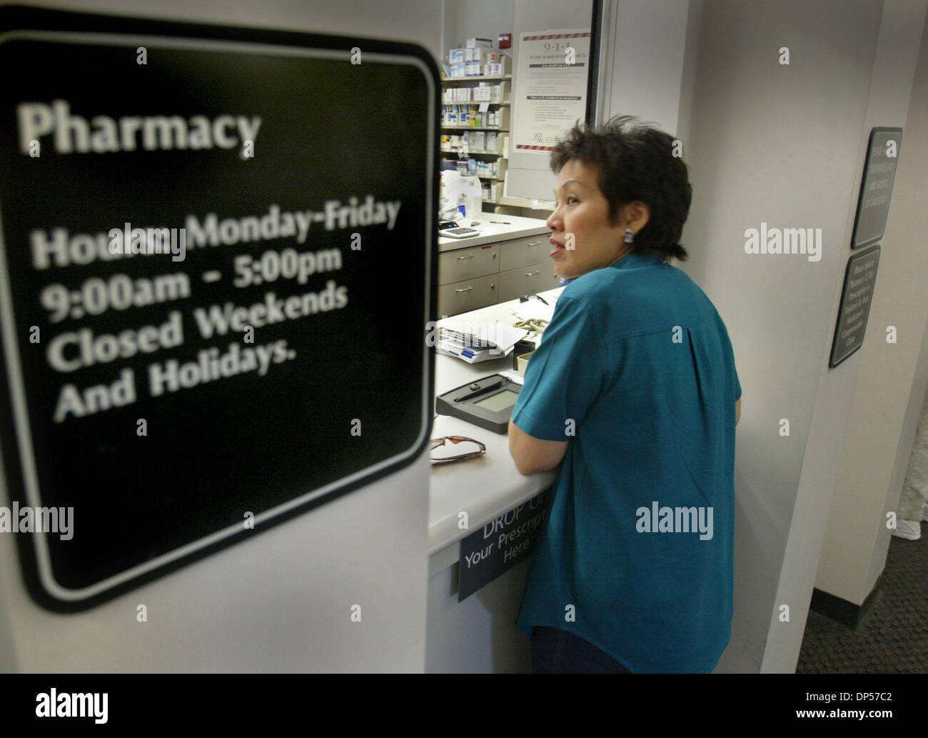 Pharmacist in pharmacy ca hi-res stock photography and images - Alamy