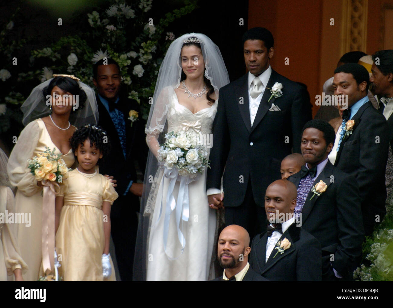 Sep 13, 2006; Manhattan, NY, USA; Actors DENZEL WASHINGTON and LYMARI NADAL film a wedding scene on the steps of Mt. OIivet Baptist Church in Harlem from the upcoming film 'American Gangster,' based on the true story of a Harlem drug dealer. Denzel Washington plays Frank Lucas, a.k.a 'Superfly' who smuggled heroin out of Southeast Asia in the caskets of soldiers killed in Vietnam.  Stock Photo