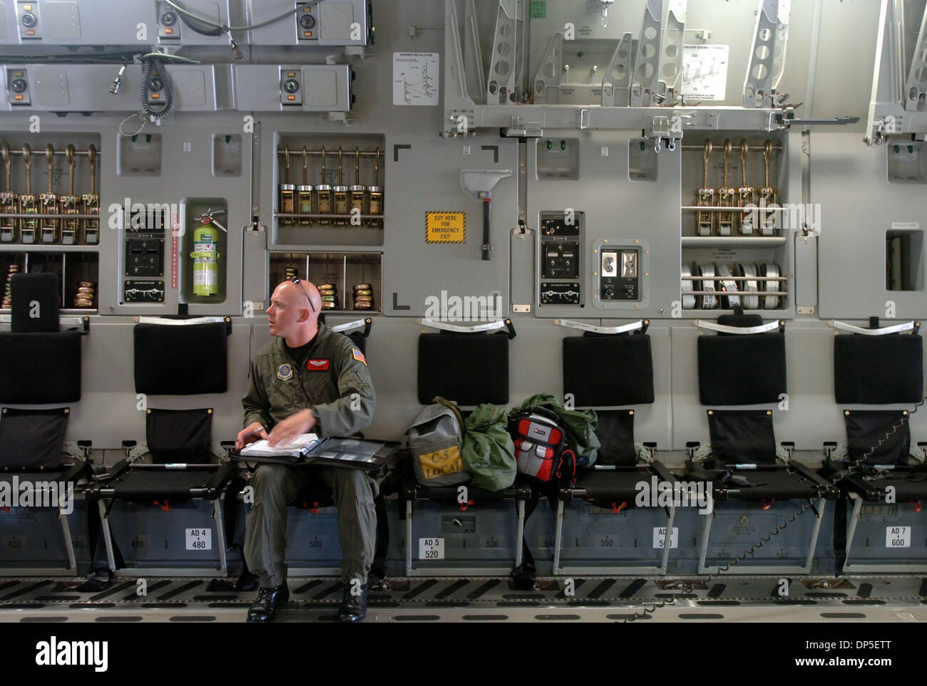 Sep 13, 2006; Fairfield, CA, USA; United States Air Force Captain Dave Weber finishes paperwork after a training exercise aboard a C-17 Globemaster III cargo plane stationed at Travis Air Force Base in Fairfield, Calif. Wednesday, September 13, 2006. Mandatory Credit: Photo by Kristopher Skinner/Contra Costa Times/ZUMA Press. (©) Copyright 2006 by Contra Costa Times Stock Photo