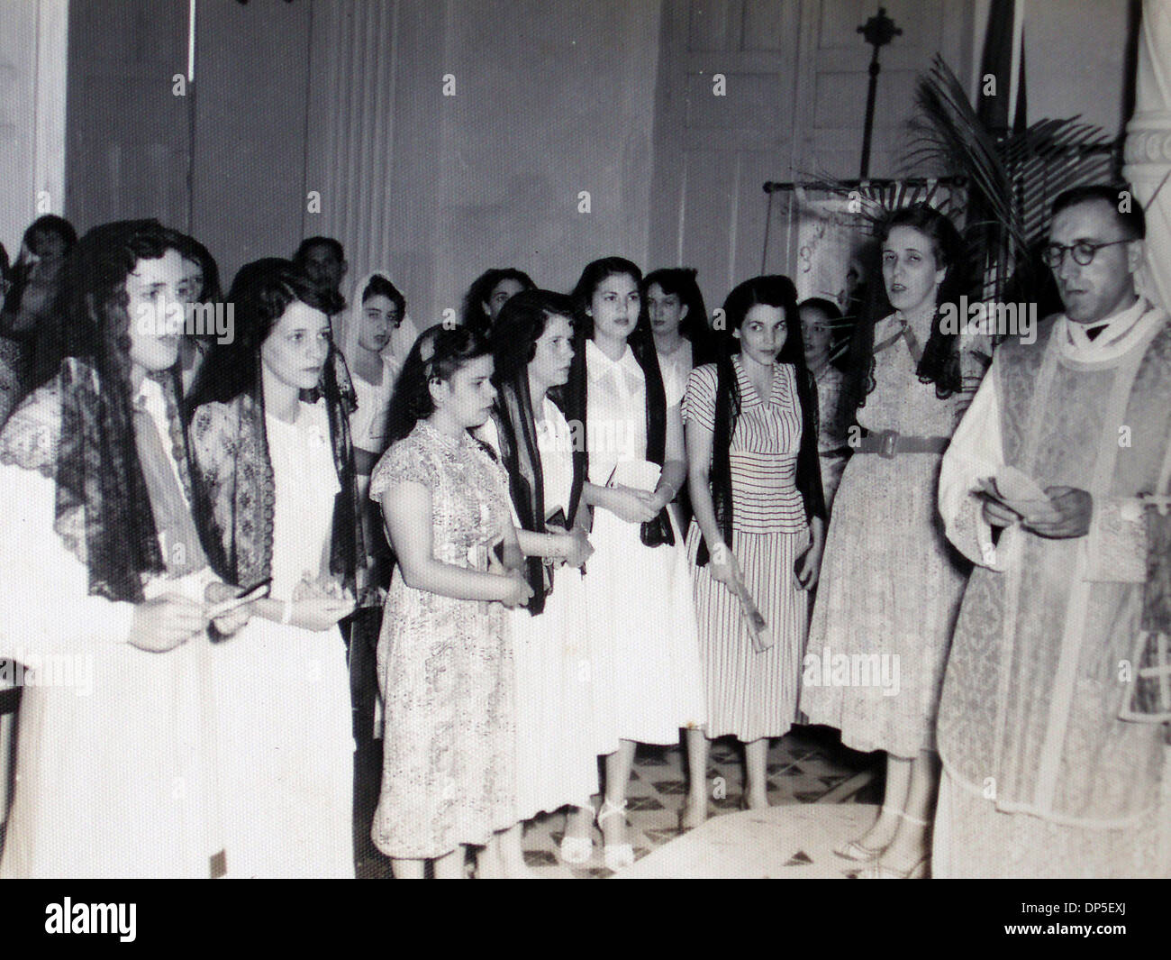 Sep 13, 2006; Havana, CUBA; My mother, Iraida, second from the left, at a church function. This was a weekly social activity for the girls from the neighborhood. Also pictured, third from the right, is my mother's late sister, Hortencia. Mandatory Credit: Photo by Palm Beach Post/ZUMA Press. (©) Copyright 2006 by Palm Beach Post Stock Photo