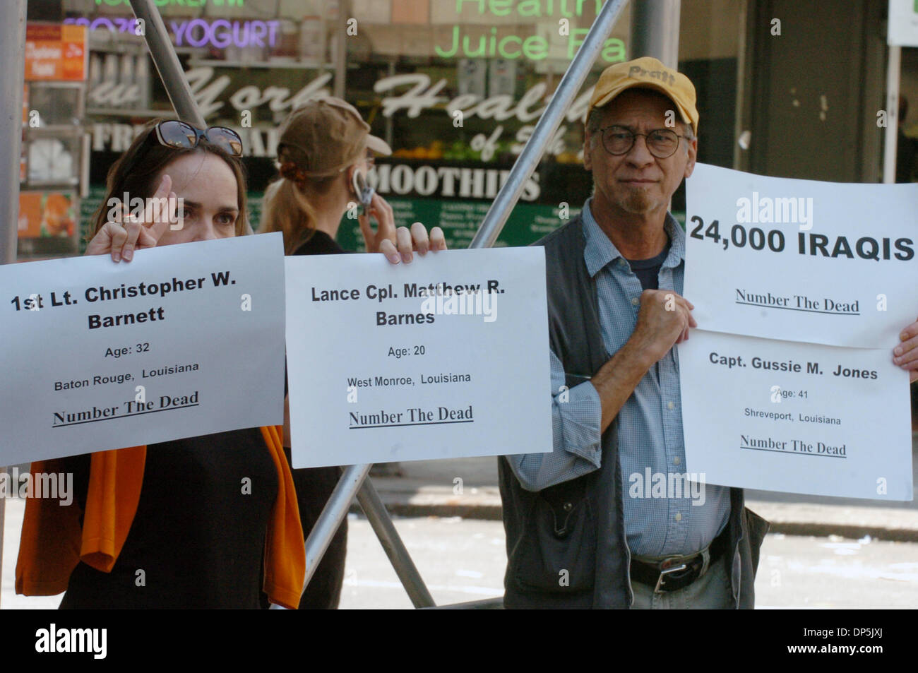 Sep 17, 2006; Manhattan, NY, USA; People line Fifth Avenue holding signs with the names of U.S. soldiers killed in war in Iraq in a demonstration called 'Number The Dead'. The demonstration is an effort to draw attention to the number of U.S. soldiers killed and Iraqi civilians killed as a result of the war in Iraq.  Mandatory Credit: Photo by Bryan Smith/ZUMA Press. (©) Copyright  Stock Photo