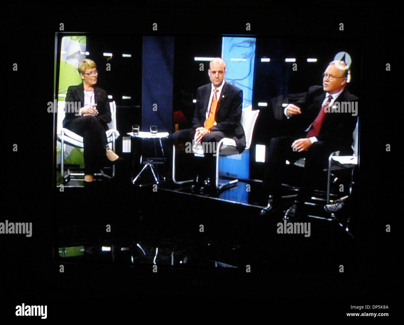 Sep 18, 2006; Stockholm, SWEDEN; TV4 Screenshot of Prime Minister candidates left to right: MAUD OLOFSSON, of the Center Party, FREDRIK REINFELDT, of the Moderate Party and GORAN PERSSON, incumbent Prime Minister of the Social Democratic Party during debate broadcast in Sweden. Reinfeldt has started work on forming a coalition government in Sweden on today after ending 12 years of  Stock Photo