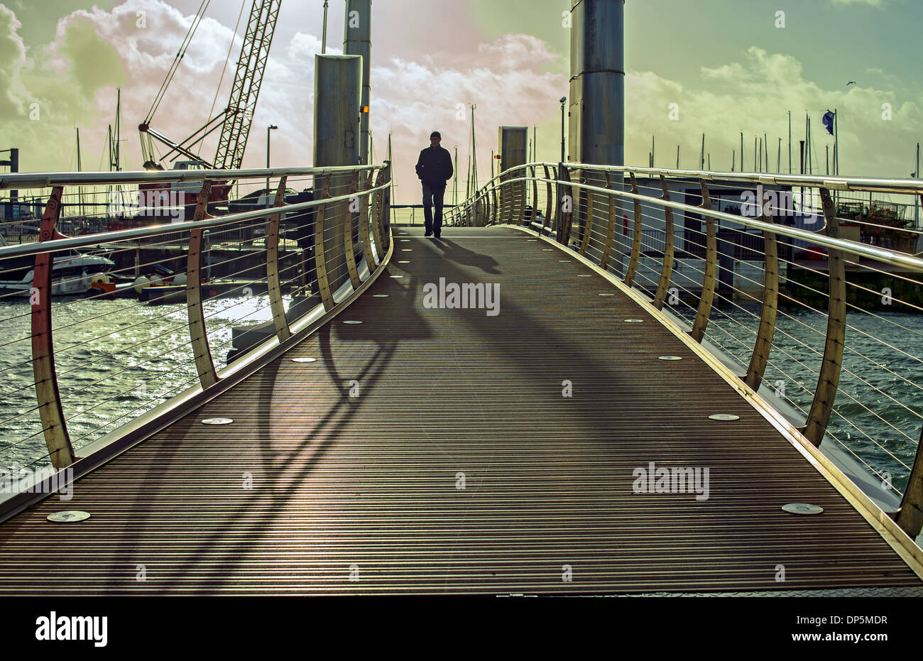 Walking across bridge hi-res stock photography and images - Alamy