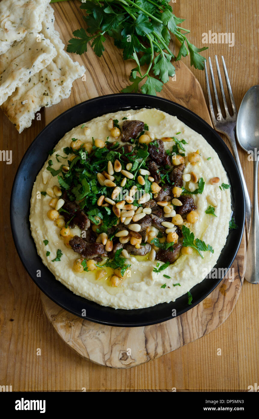 Hummus with lamb meat Stock Photo