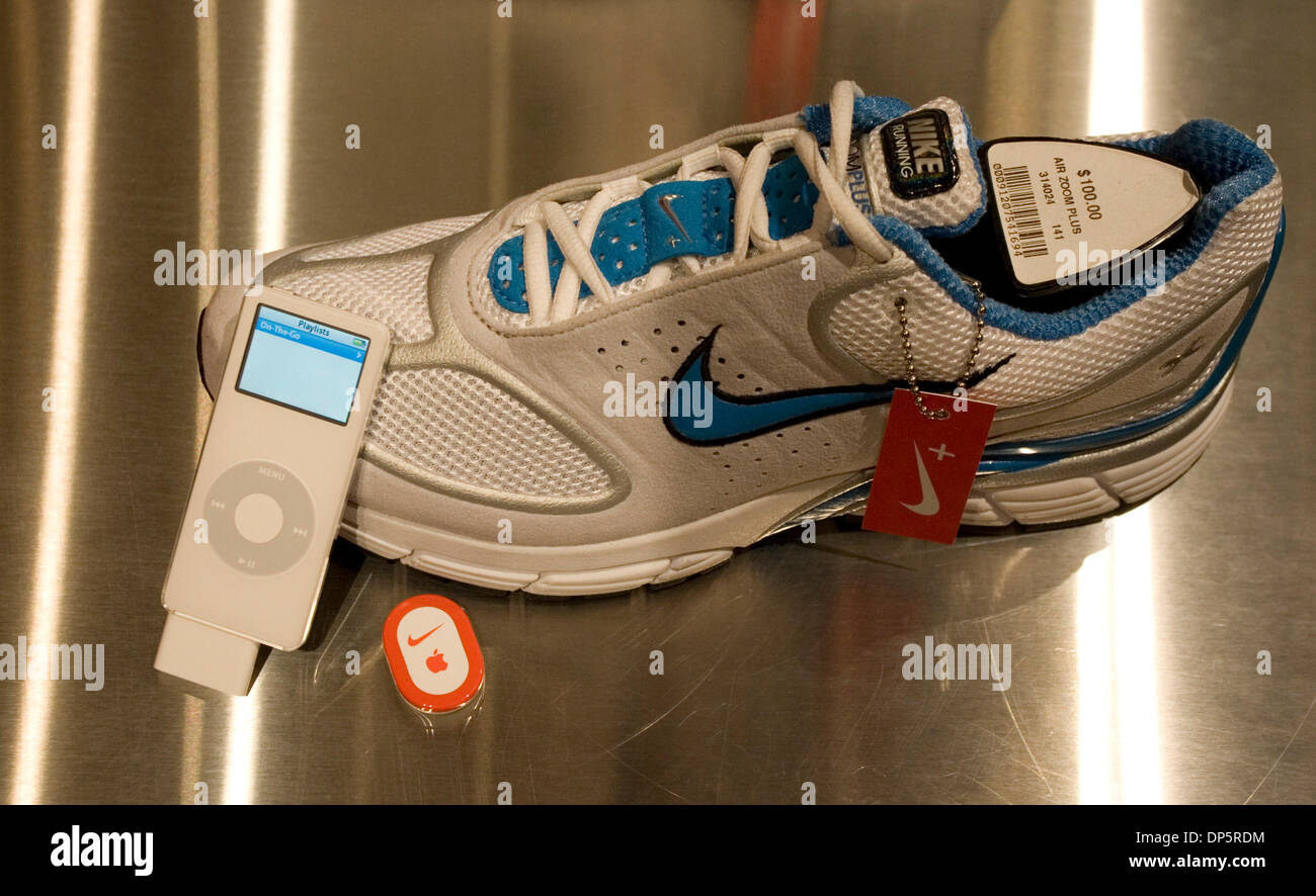 Sep 22, 2006; Portland, OR, USA; Nike shows and iPod are displayed at the  Niketown in downtown Portland. Nike is a major American manufacturer of  athletic shoes, clothing and sports equipment. The