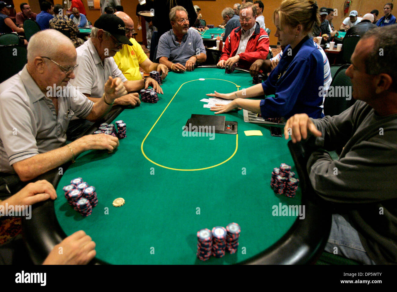 Sep 26, 2006; Alpine, CA, USA; Clockwise, from left: JIM STANFILL, LES PAYNE, CHUCK RAVENSCRAFT, HERB HOLLAND, BILL BRUNER, RICK COOK, dealer BONNIE GAY and MITCHELL LEVY, right,  banter at the poker table during a game of seven card stud at Viejas Casino near Alpine.  Mandatory Credit: Photo by Laura Embry/SDU-T/ZUMA Press. (©) Copyright 2006 by SDU-T Stock Photo