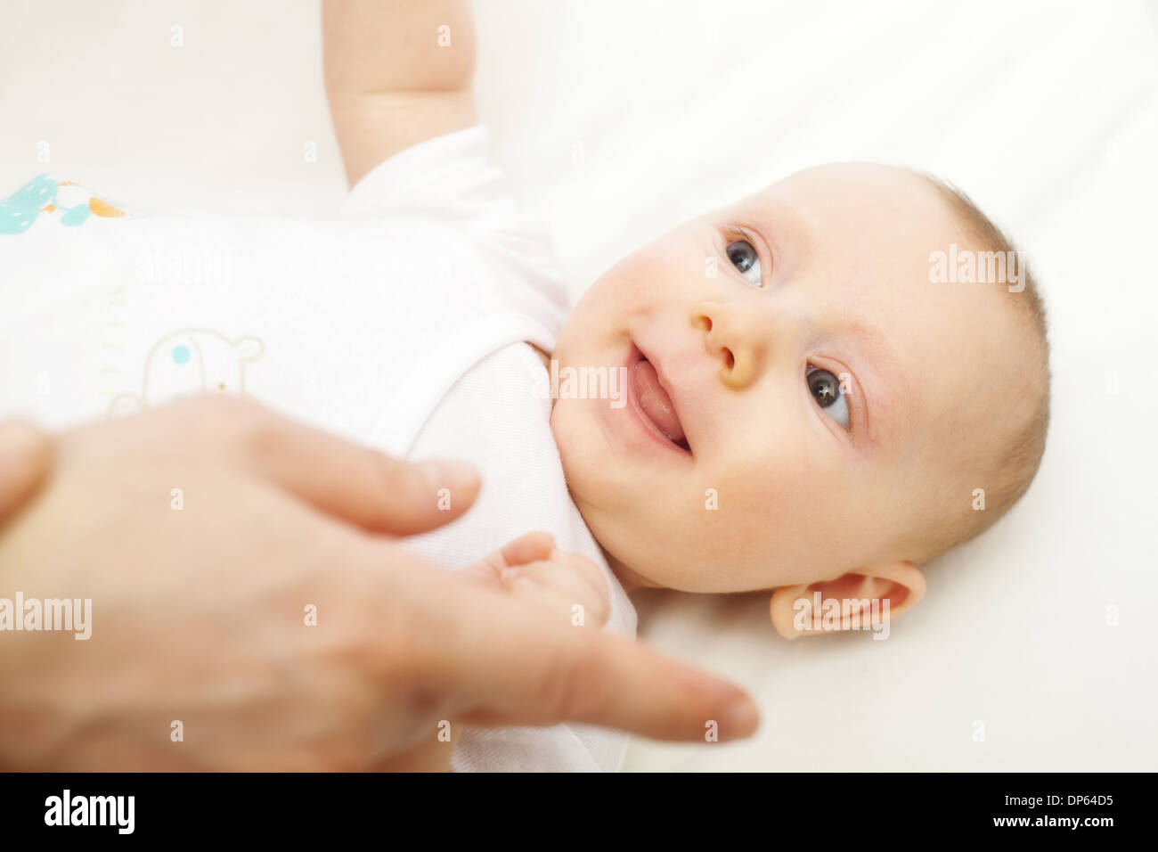 caucasian baby play with his mother Stock Photo