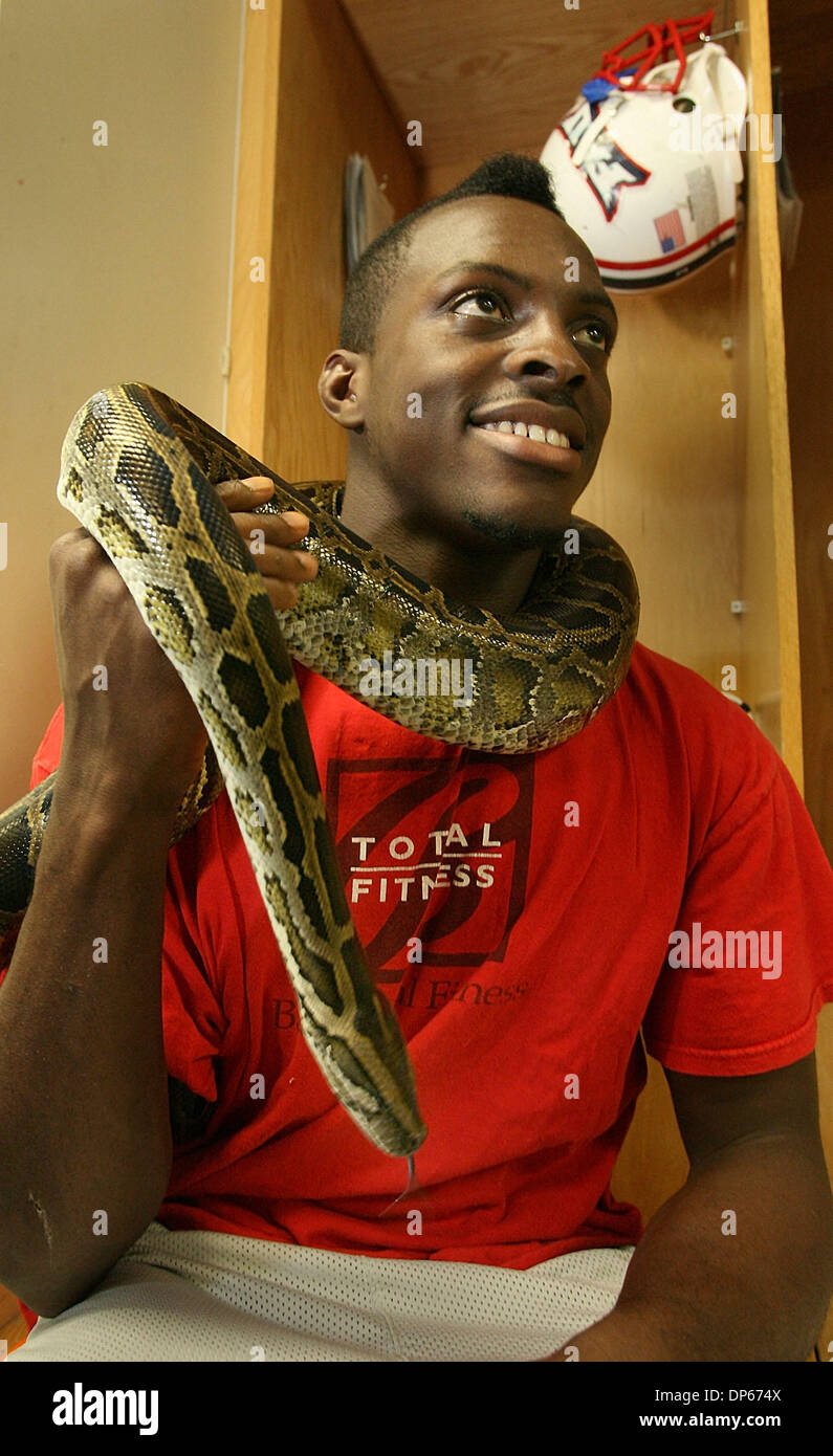 Oct 06, 2006; Boca Raton, FL, USA; Greg Joseph holds his almost 7 foot-long Burmese Python, Big Boy, in the locker room of the Oxley Athletic Center on the campus of Florida Atlantic University, Friday.  Mandatory Credit: Photo by Bob Shanley/Palm Beach Post/ZUMA Press. (©) Copyright 2006 by Palm Beach Post Stock Photo