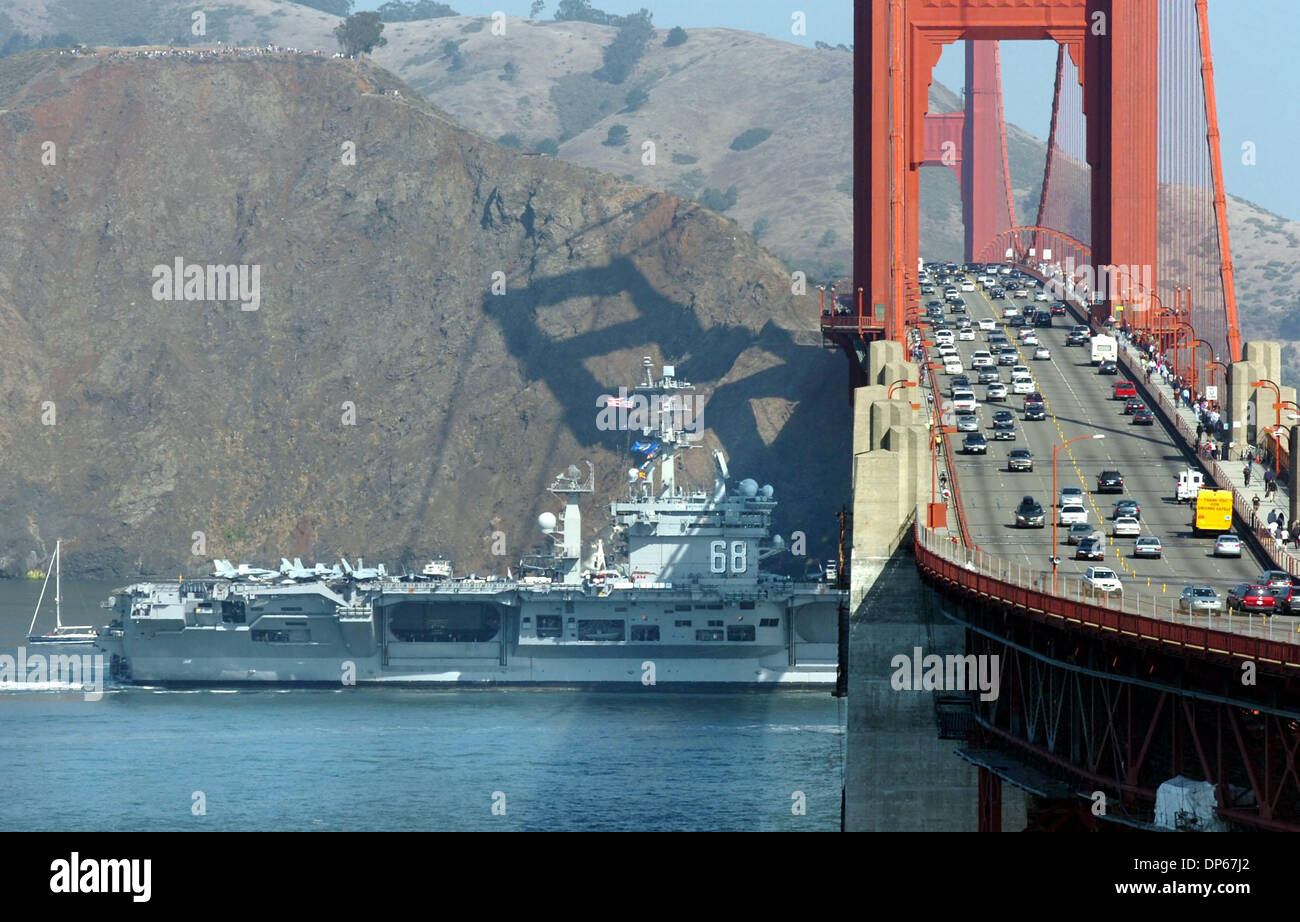 Oct 07, 2006; San Francisco, CA, USA; Fleet Week activities on Saturday Oct. 7, 2006 commenced with the Parade of Navy Ships, led by the 1100-foot long USS Nimitz (CVN 68) first to pass under the Golden Gate Bridge.  Sunday's events include the Blue Angels air show at 1:00 and ship tours from 10-4.  Sunday's events include the Blue Angels air show at 1:00 and ship tours from 10-4.  Stock Photo