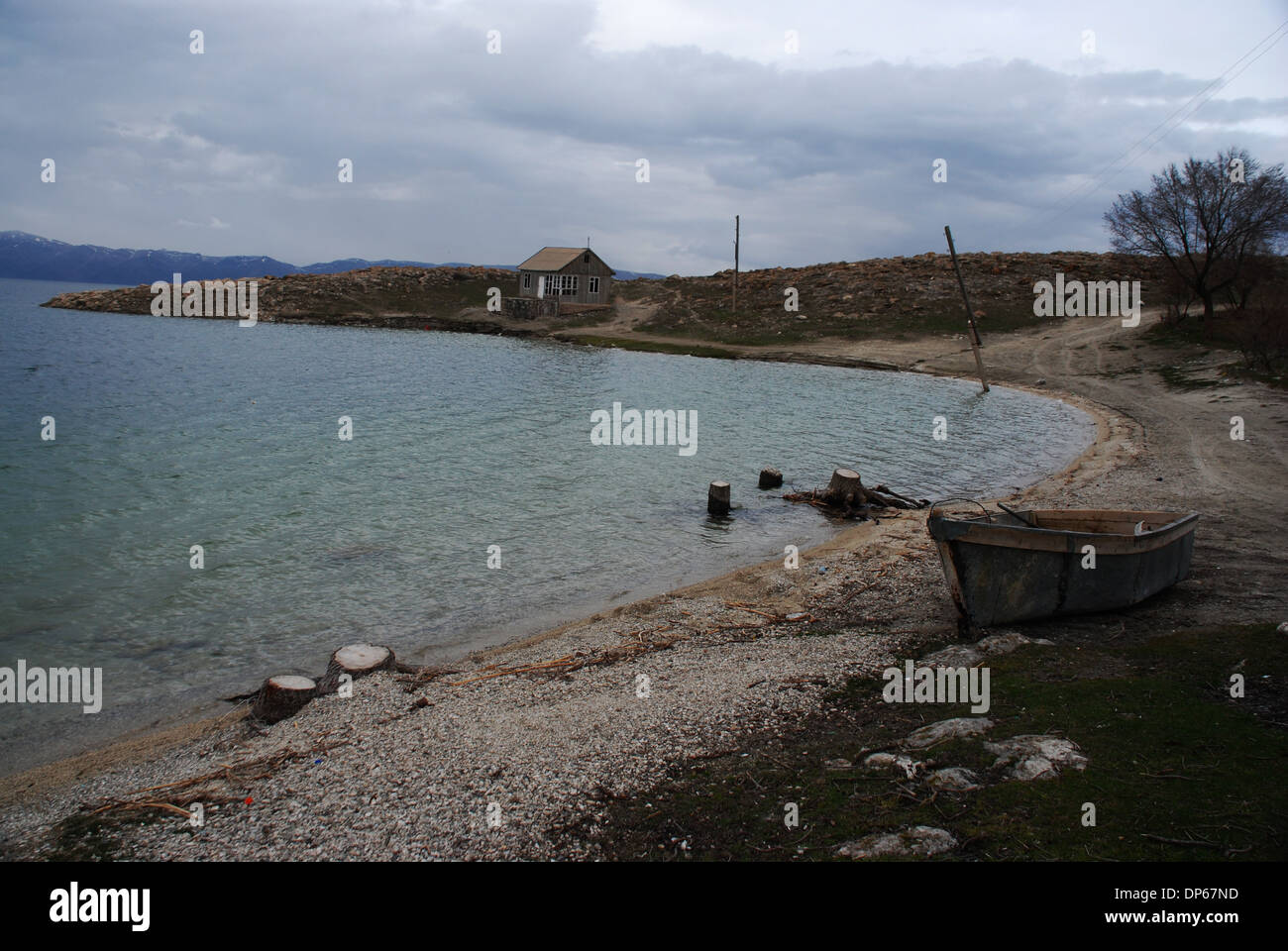 Panorama Armenia lake Sevan and cut trees Stock Photo - Alamy