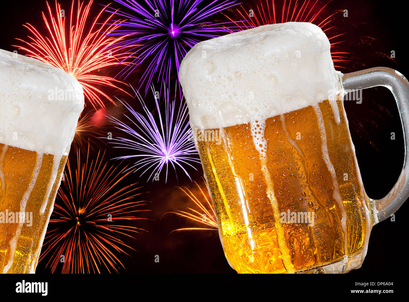 two beers with firework in the new year midnight Stock Photo